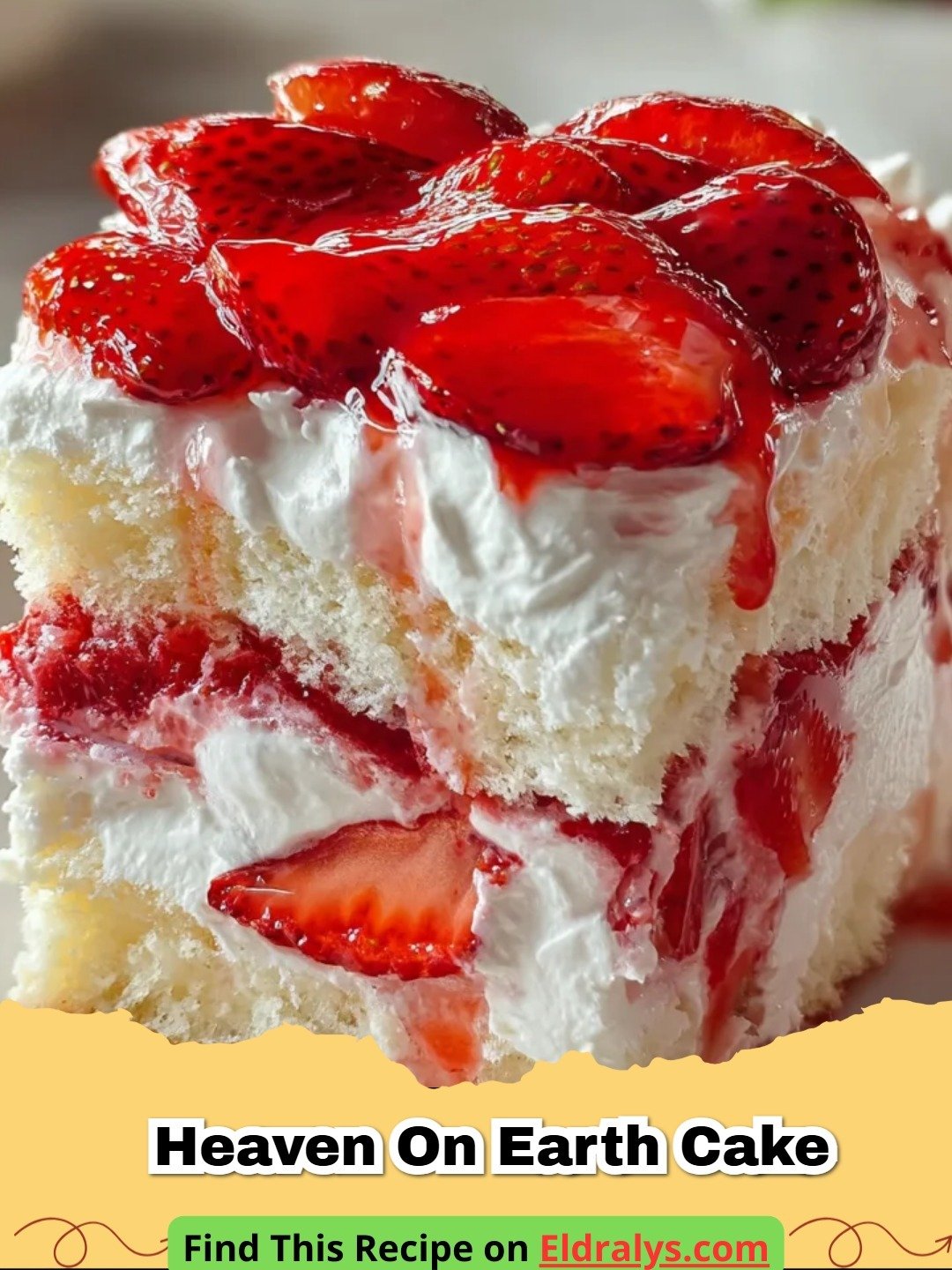 A close-up of a Strawberry Heaven on Earth Cake in a glass dish showing layers of white cake and red strawberries.