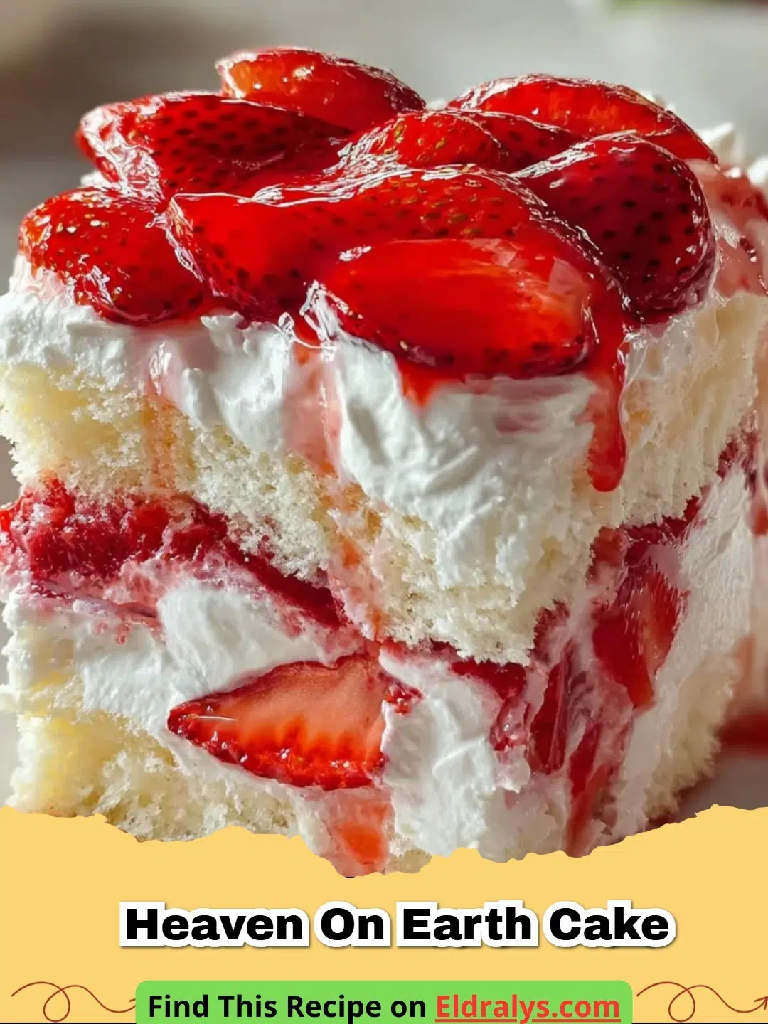 A close-up of a Strawberry Heaven on Earth Cake in a glass dish showing layers of white cake and red strawberries.