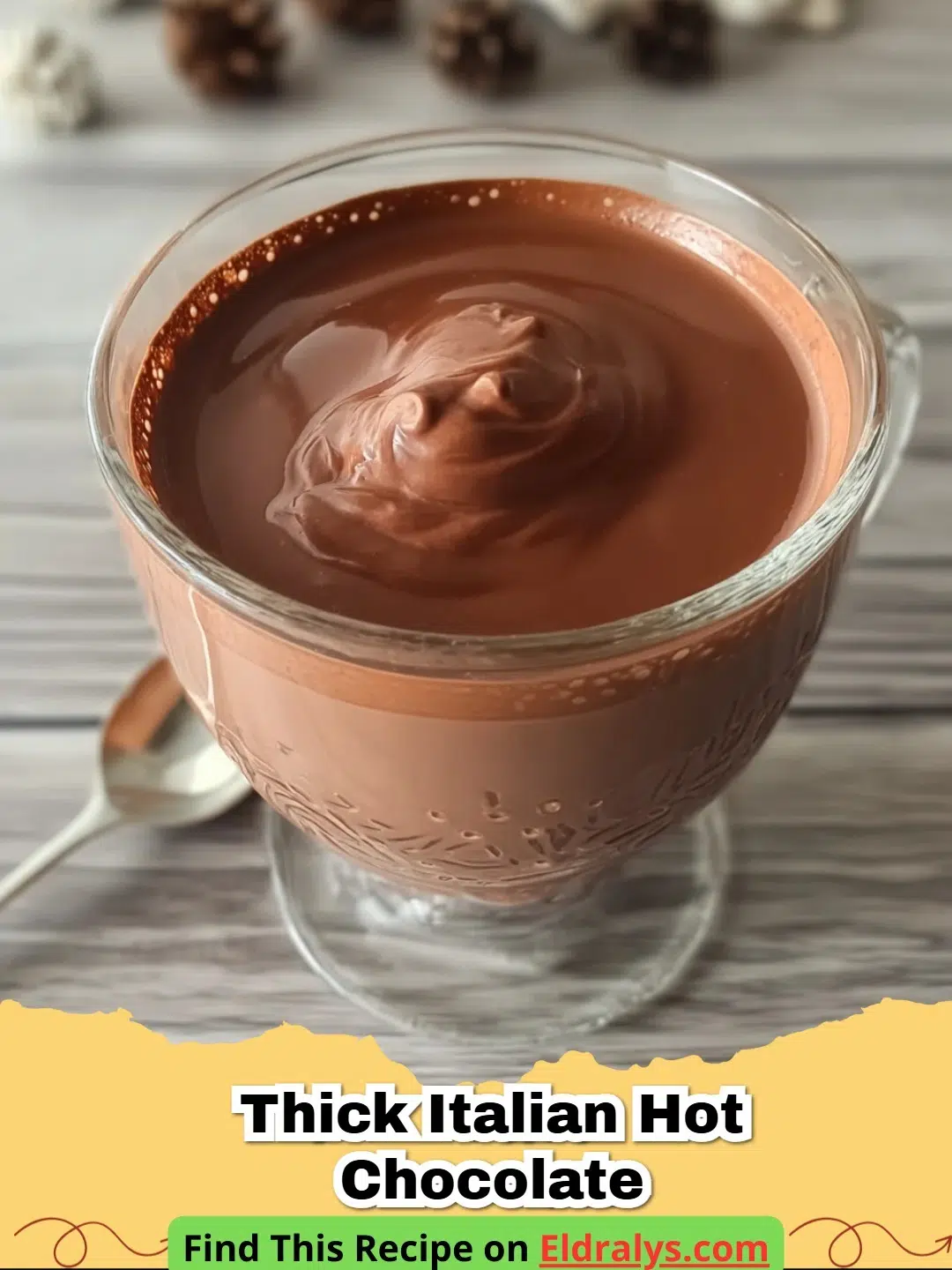 A mug of Thick Italian Hot Chocolate topped with whipped cream and chocolate shavings