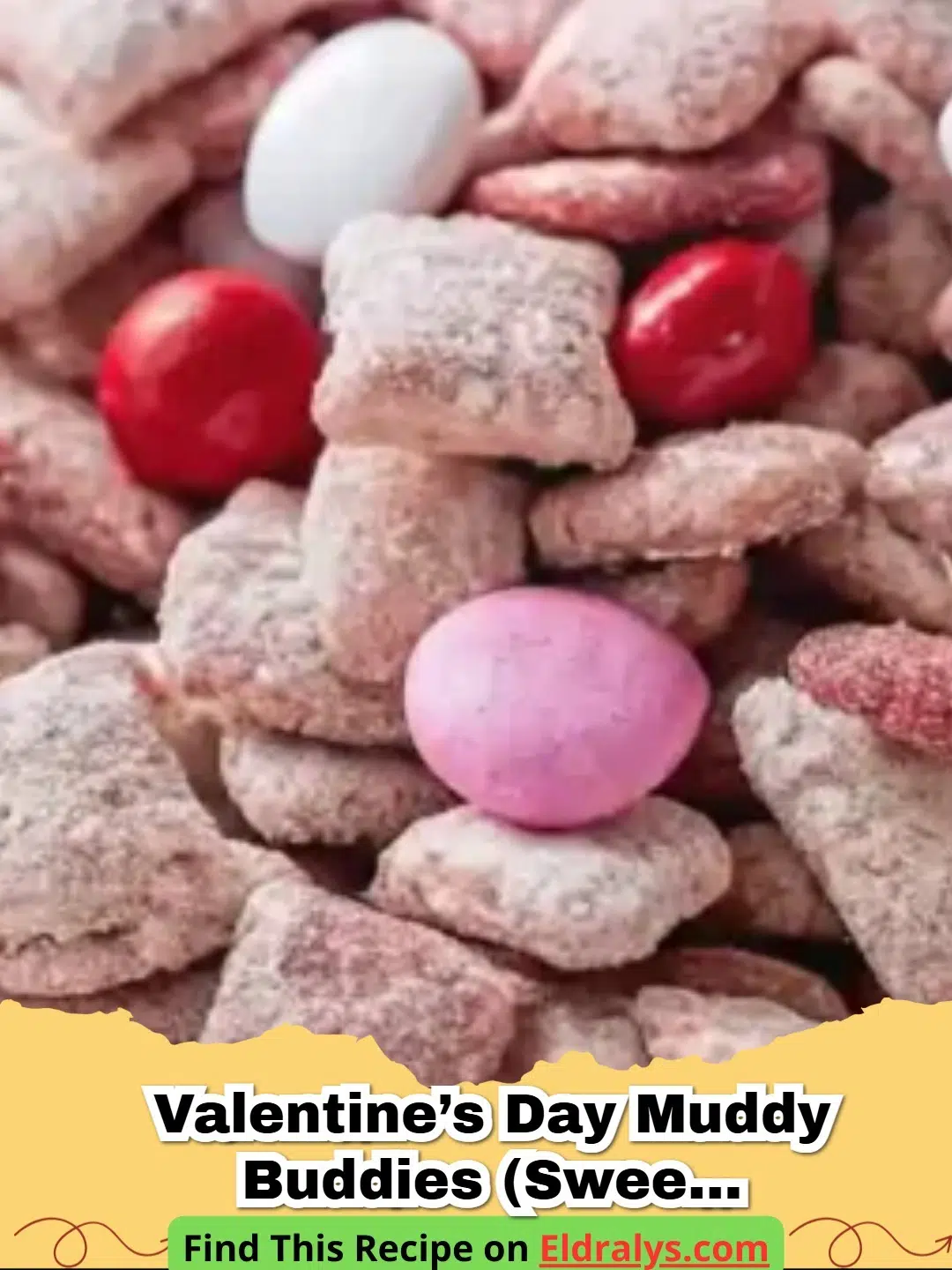 A bowl of festive Valentine’s Day Muddy Buddies with pink and red M&Ms and heart sprinkles.