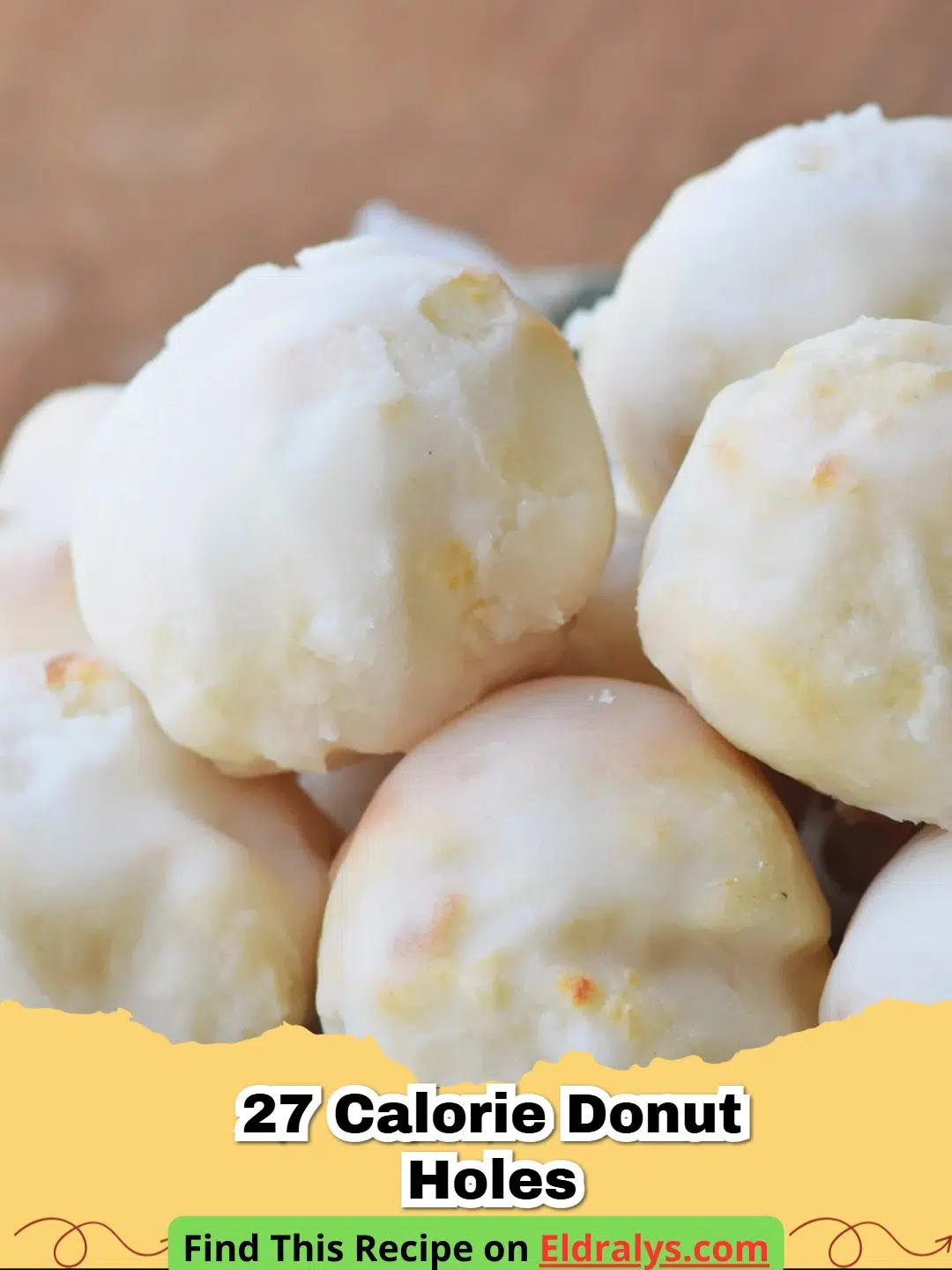 Golden brown 27 Calorie Donut Holes piled in a white bowl.