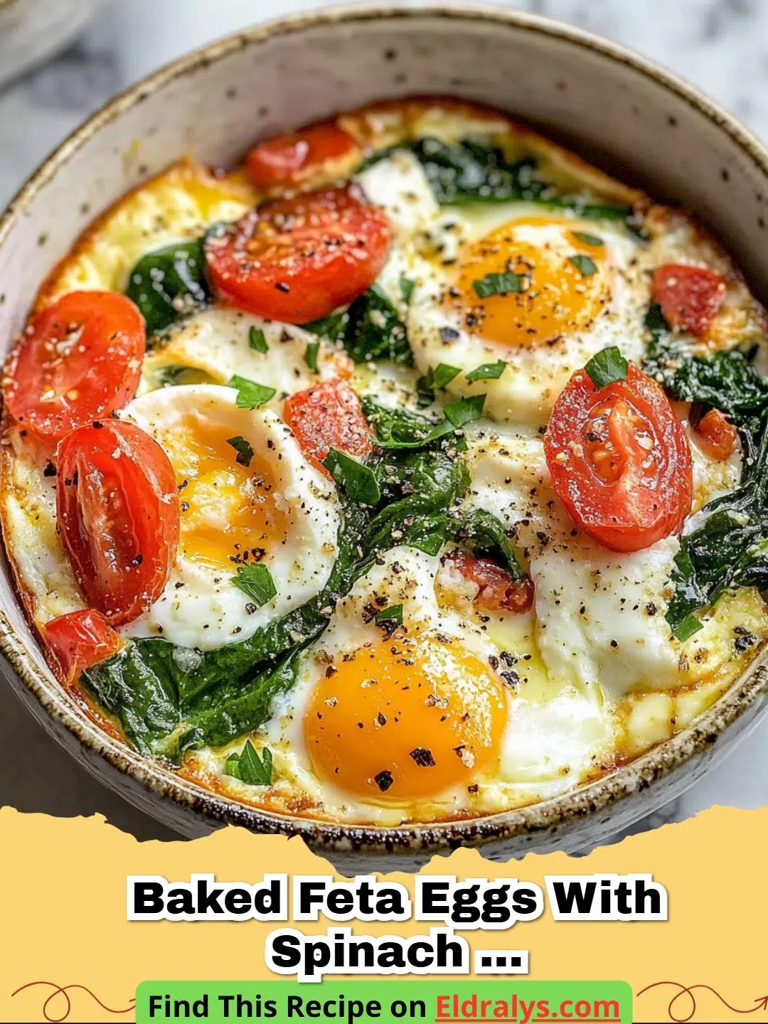 Baked Feta Eggs with Spinach and Tomatoes in a ceramic dish with crusty bread.