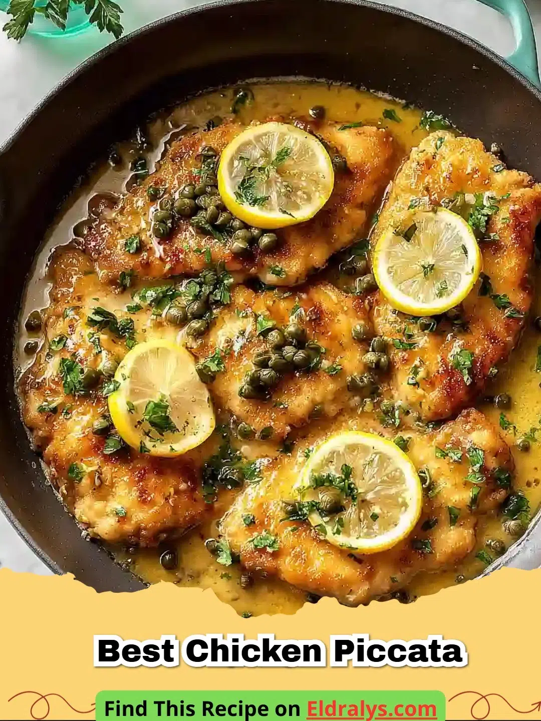 The Best Chicken Piccata served on a white plate garnished with lemon and parsley
