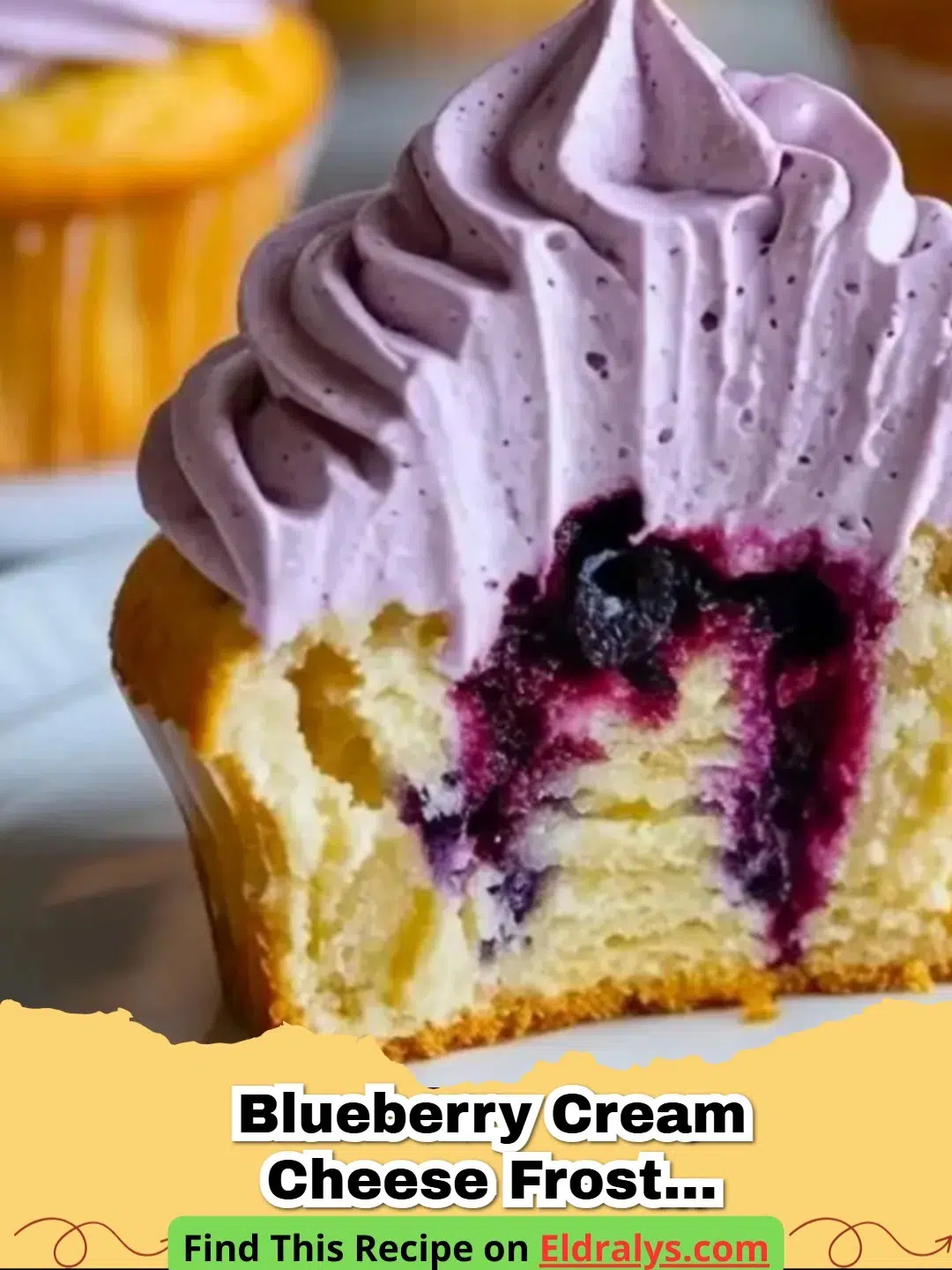 Blueberry Cream Cheese Frosting Recipe for Cakes and Cupcakes - Swirls of purple Blueberry Cream Cheese Frosting on a vanilla cupcake
