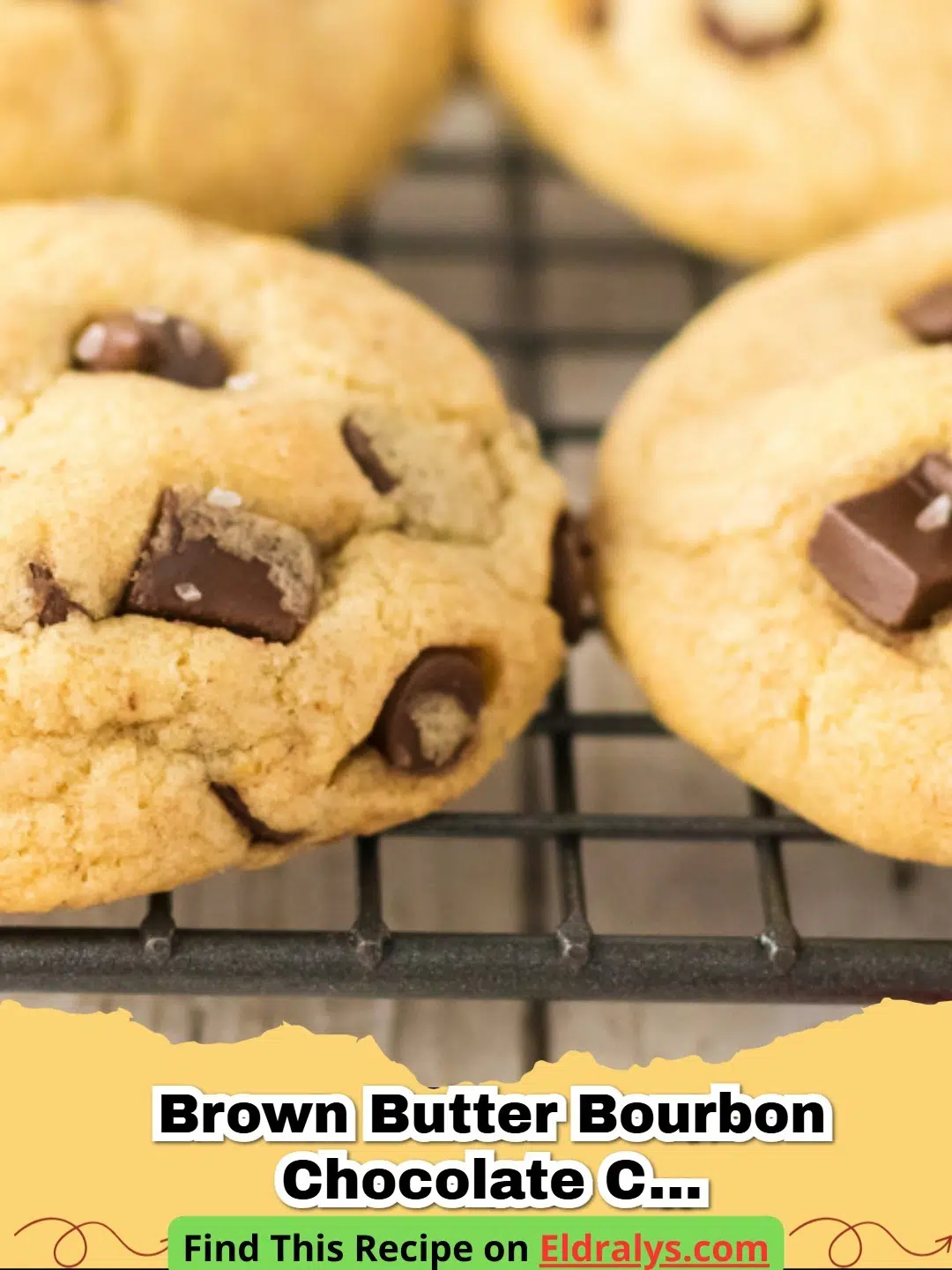 A stack of Brown Butter Bourbon Chocolate Chip Cookies with melting chocolate and sea salt on top.