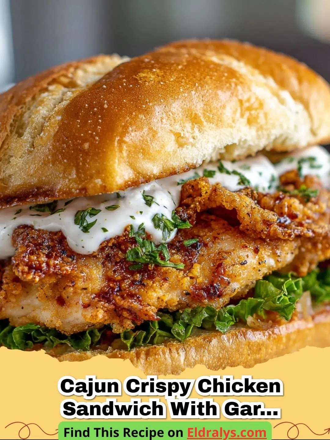 A close-up shot of a Cajun Crispy Chicken Sandwich with Garlic Aioli showing the crunchy texture and dripping sauce.
