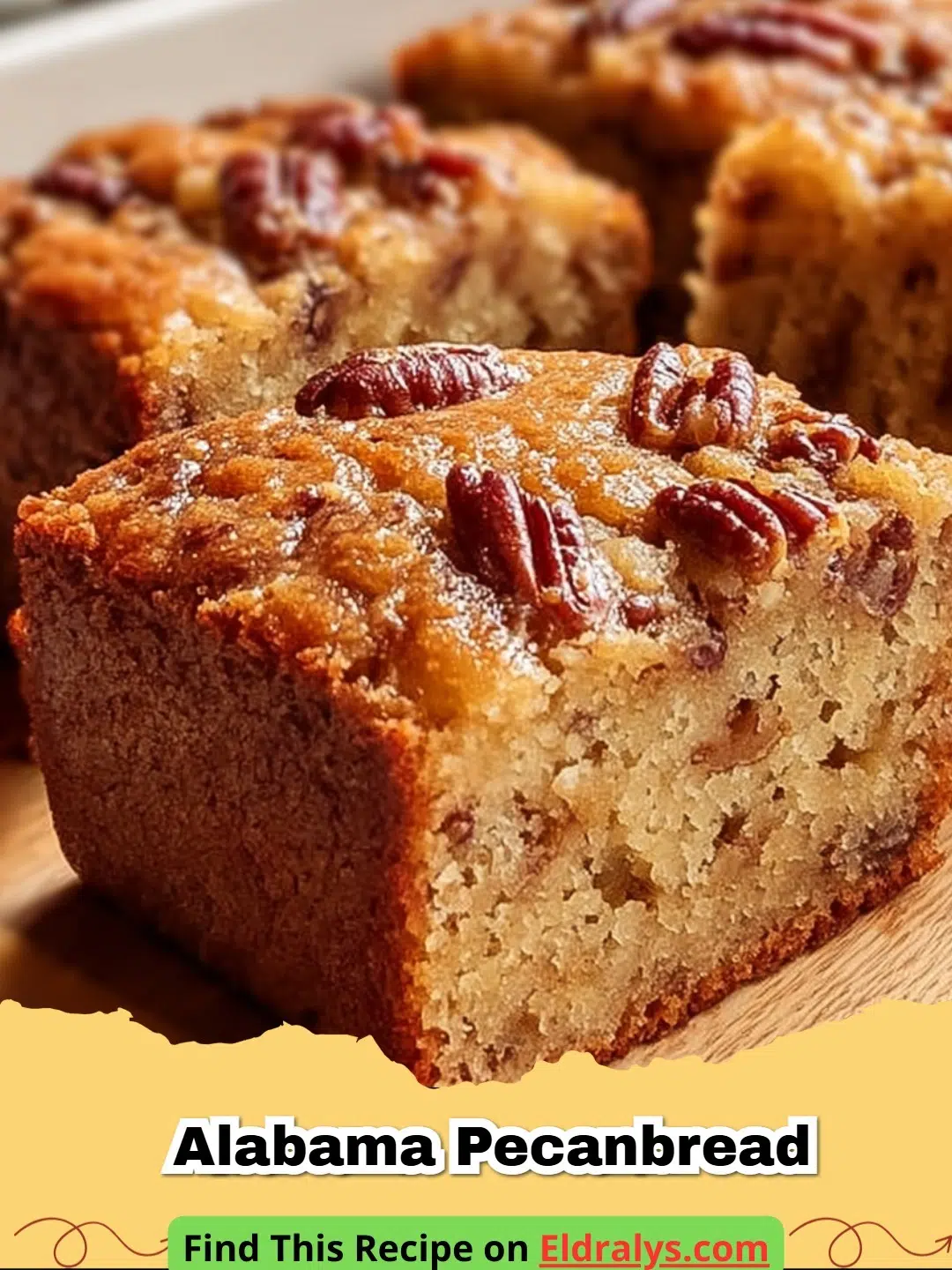 A golden-brown loaf of Alabama Pecanbread on a wooden board.