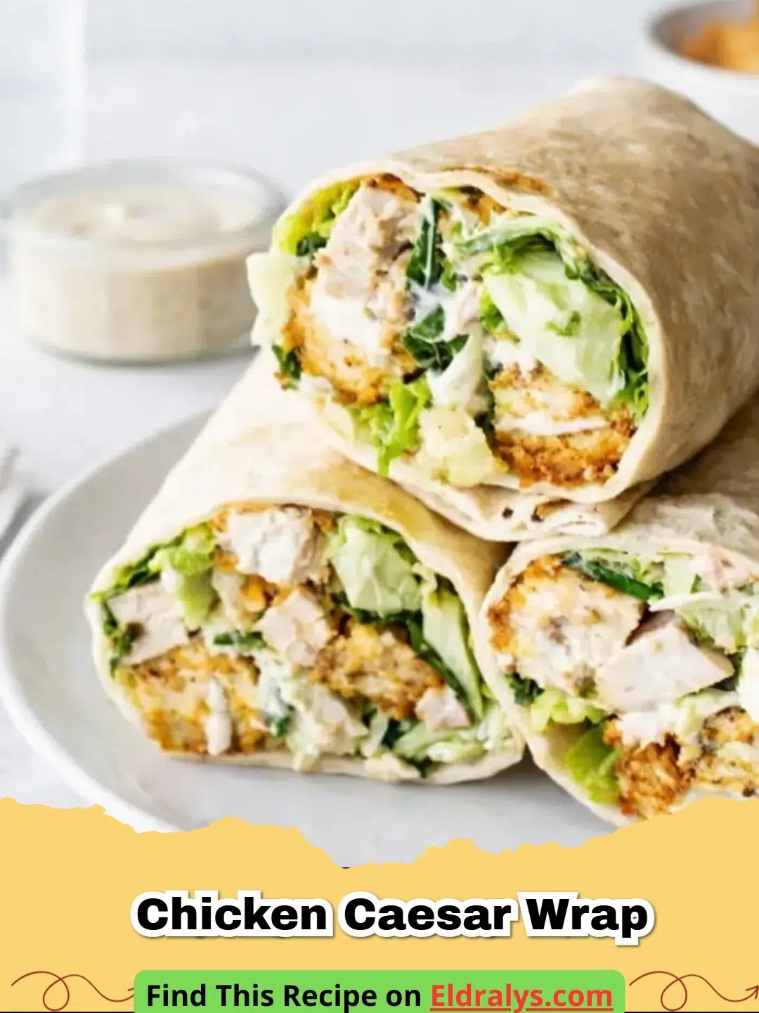 A delicious Chicken Caesar Wrap sliced in half on a white plate