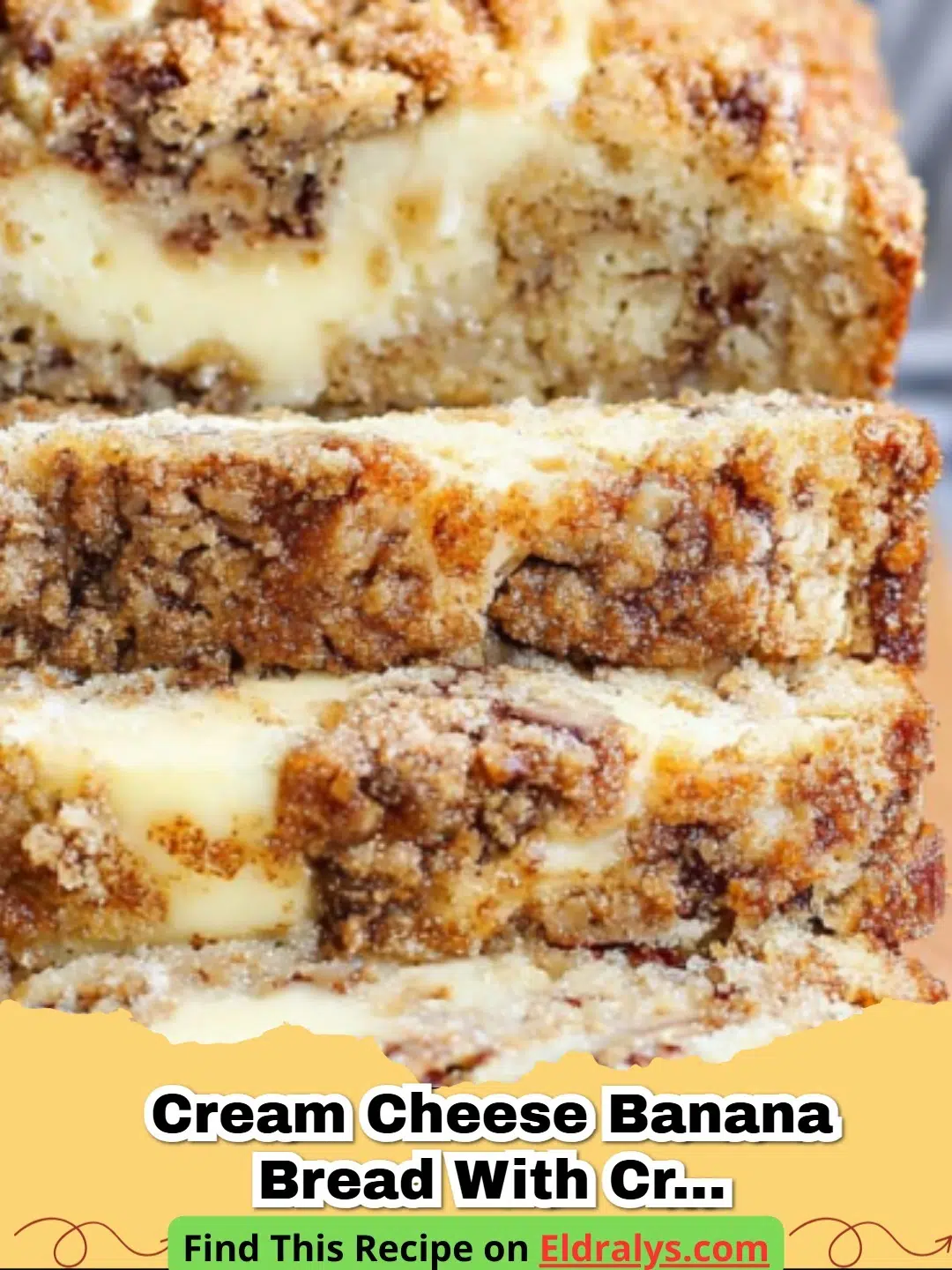 A thick slice of Cream Cheese Filled Banana Bread with Crumb Topping showing the cream cheese swirl.
