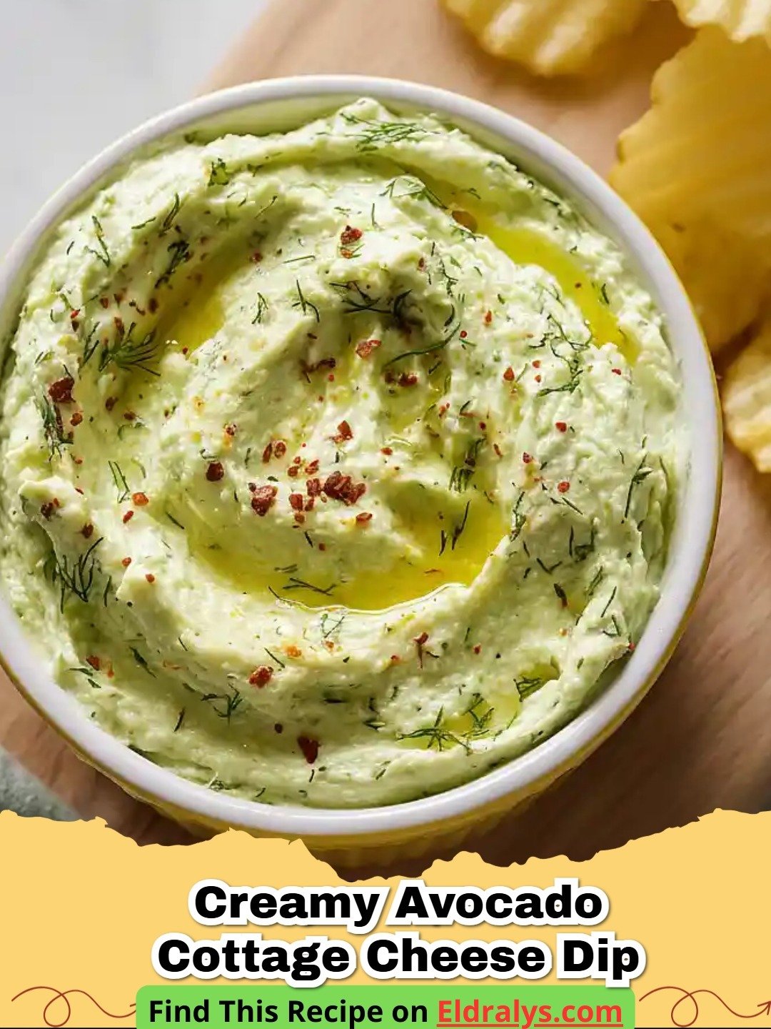 A bowl of Creamy Avocado Cottage Cheese Dip garnished with cilantro and lime