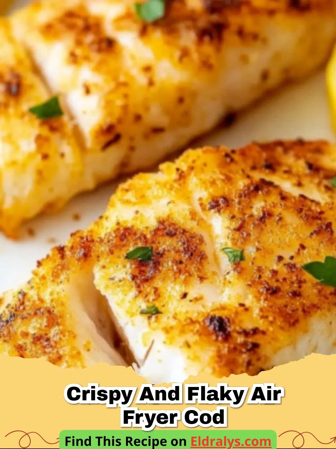 Golden brown Crispy and Flaky Air Fryer Cod fillets on a plate with lemon wedges.