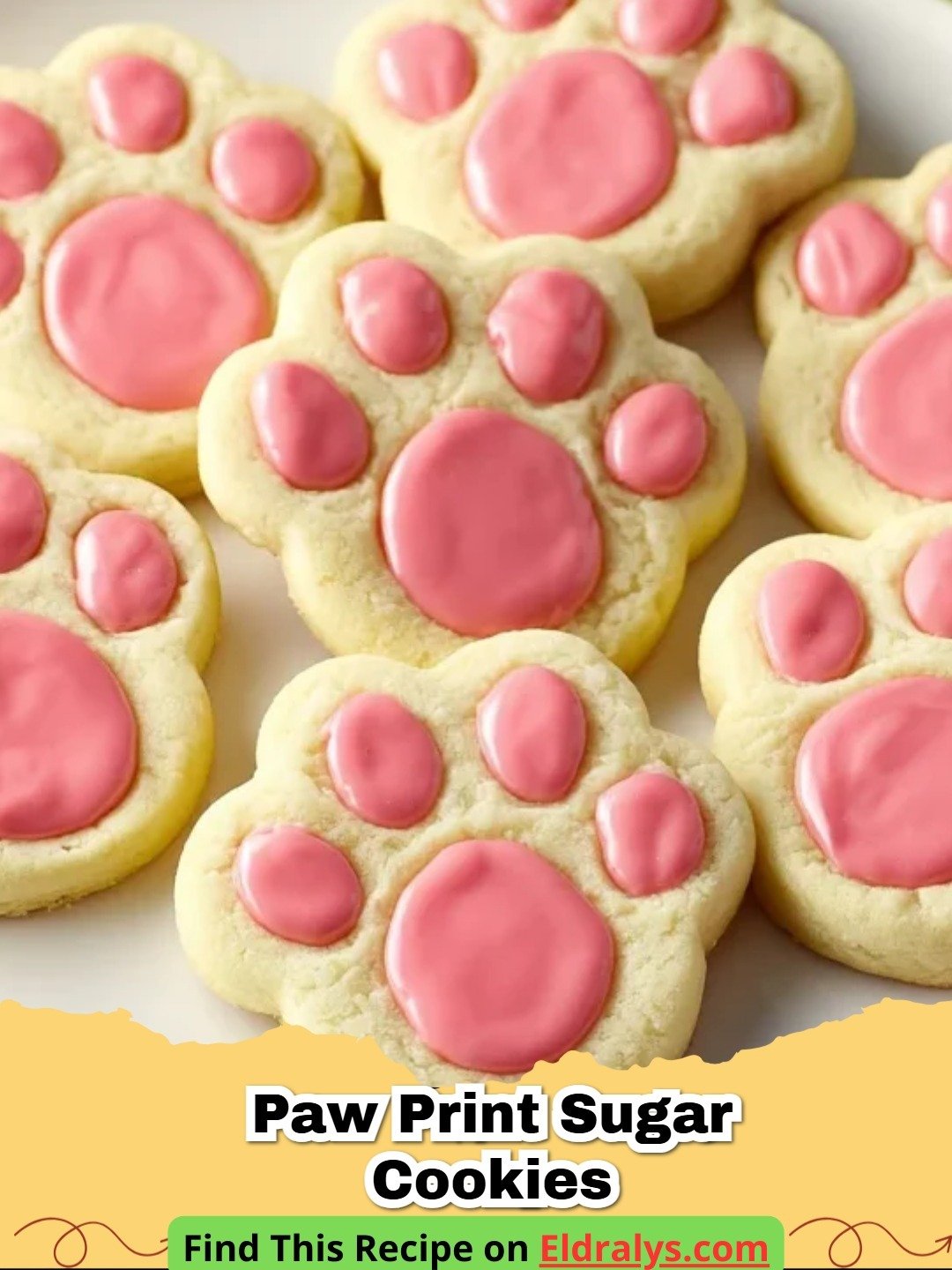 A tray of freshly baked Paw Print Sugar Cookies with chocolate pads and toes.