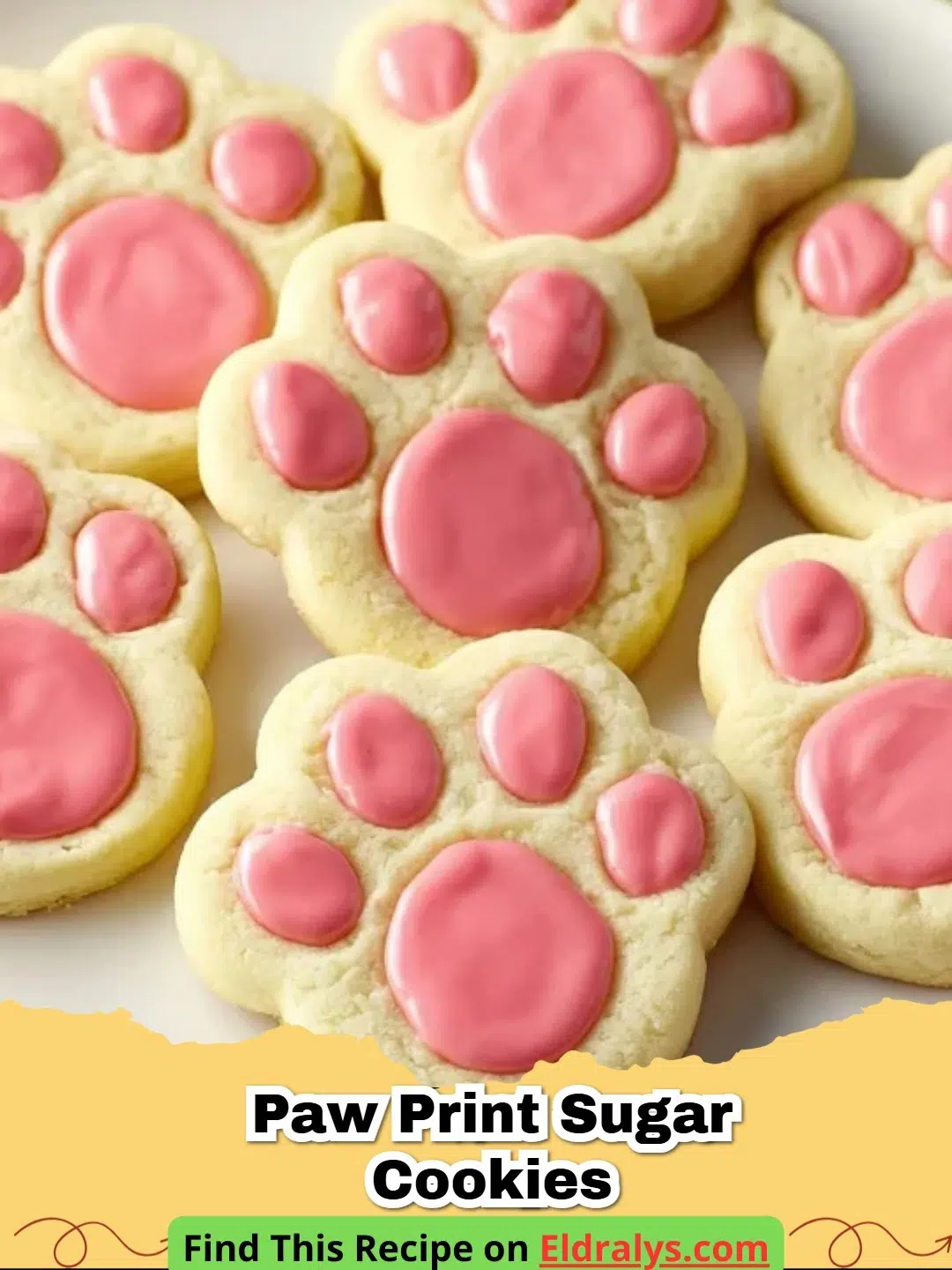 A tray of freshly baked Paw Print Sugar Cookies with chocolate pads and toes.