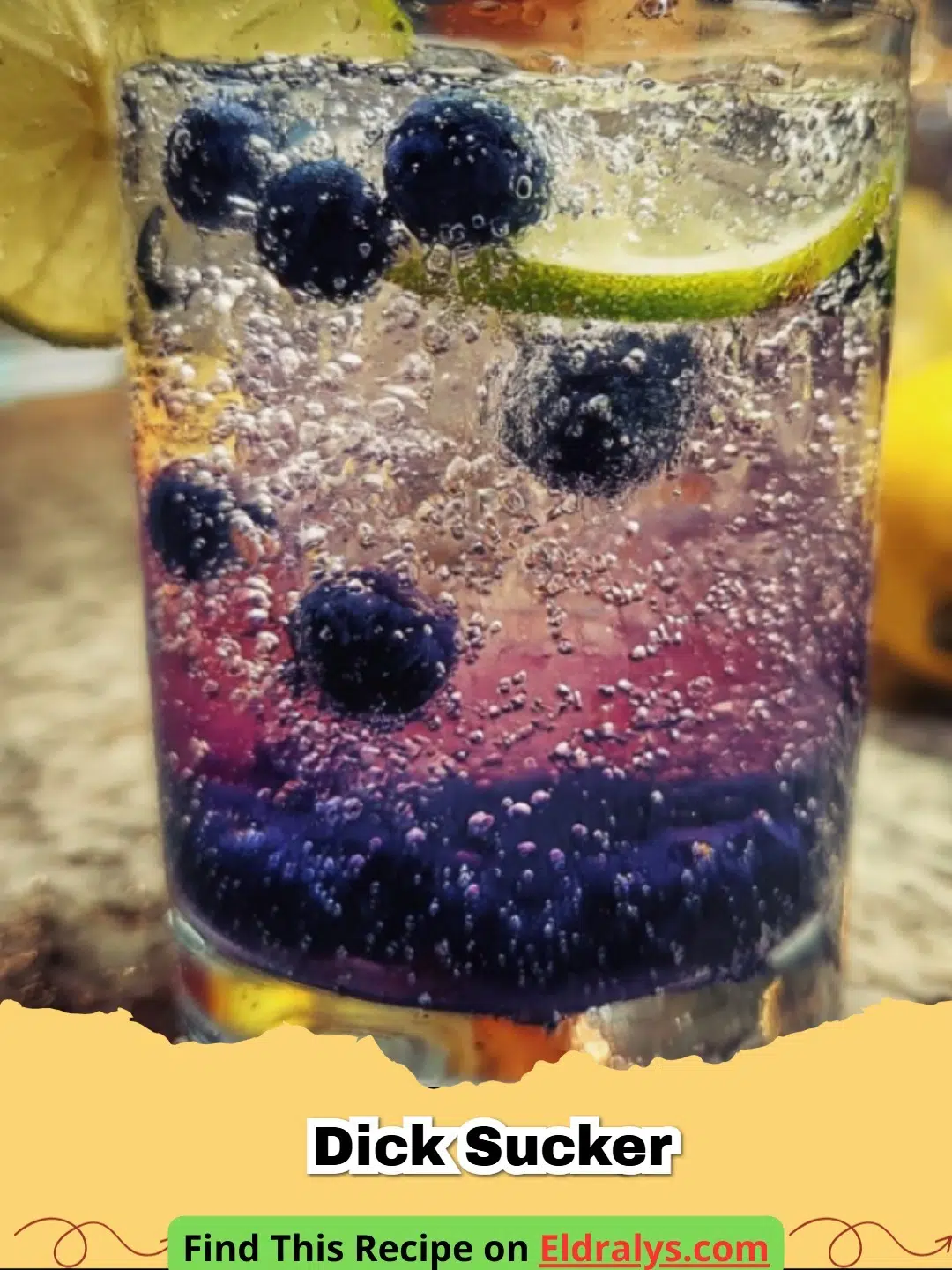 A vibrant Dick Sucker Cocktail in a tall glass with ice and a fruit garnish.