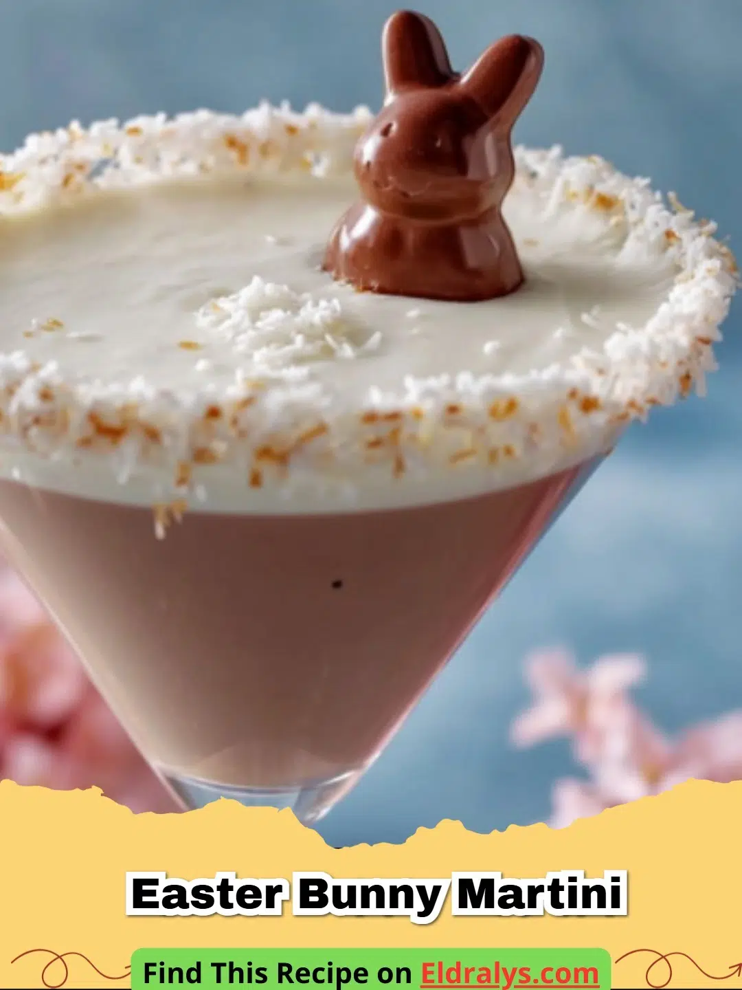 A creamy white Easter Bunny Martini Recipe with a coconut rim and chocolate bunny garnish.