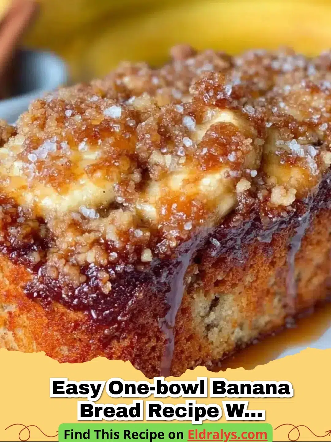 A fresh loaf of Easy One-Bowl Banana Bread with Crunchy Streusel Topping on a wooden board.