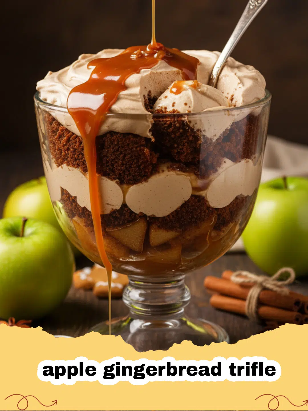 apple gingerbread trifle - A beautiful glass trifle bowl filled with layers of gingerbread, sautéed apples, and white cream.