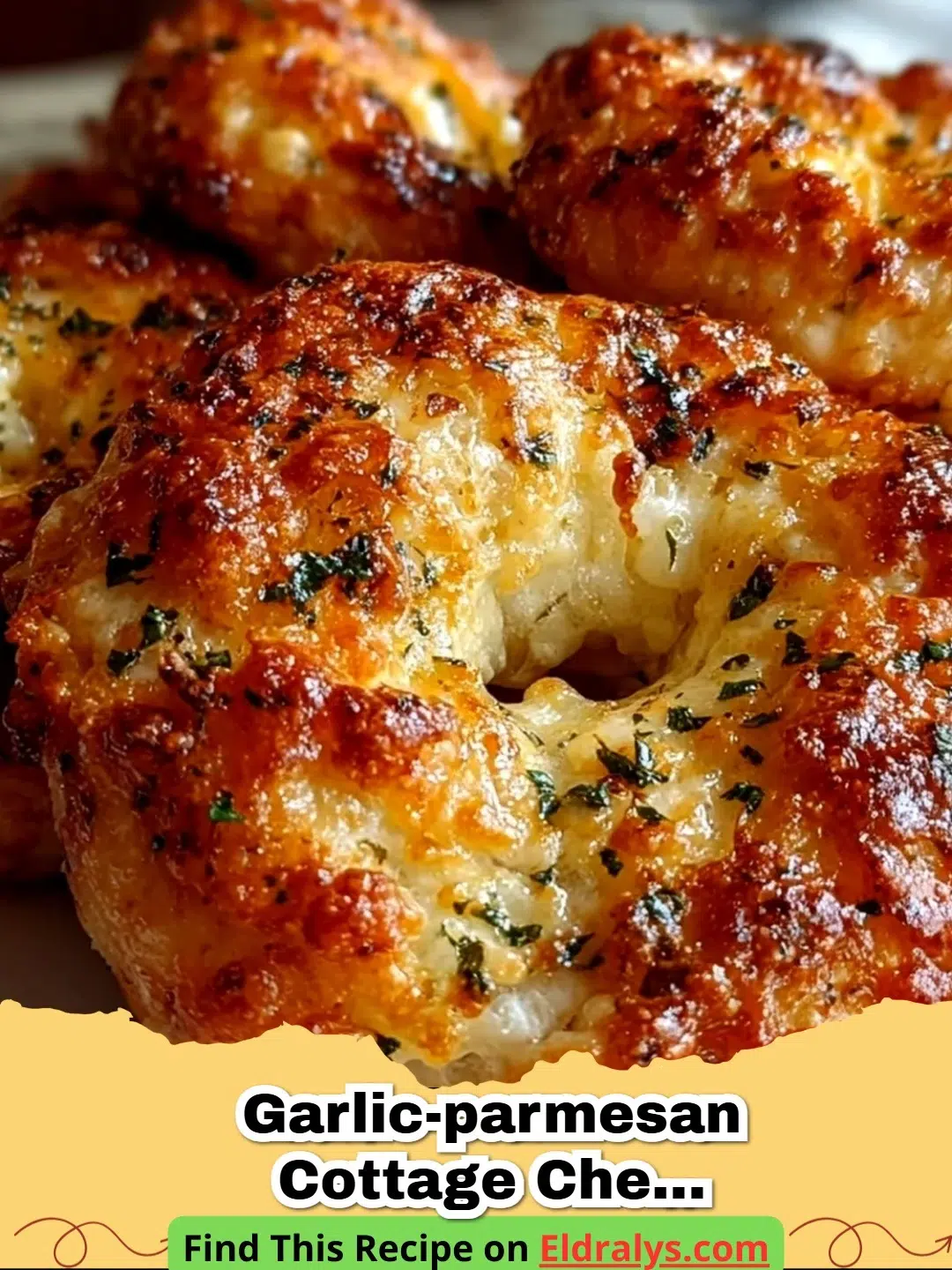 Freshly baked Garlic-Parmesan Cottage Cheese Bagels on a cooling rack.