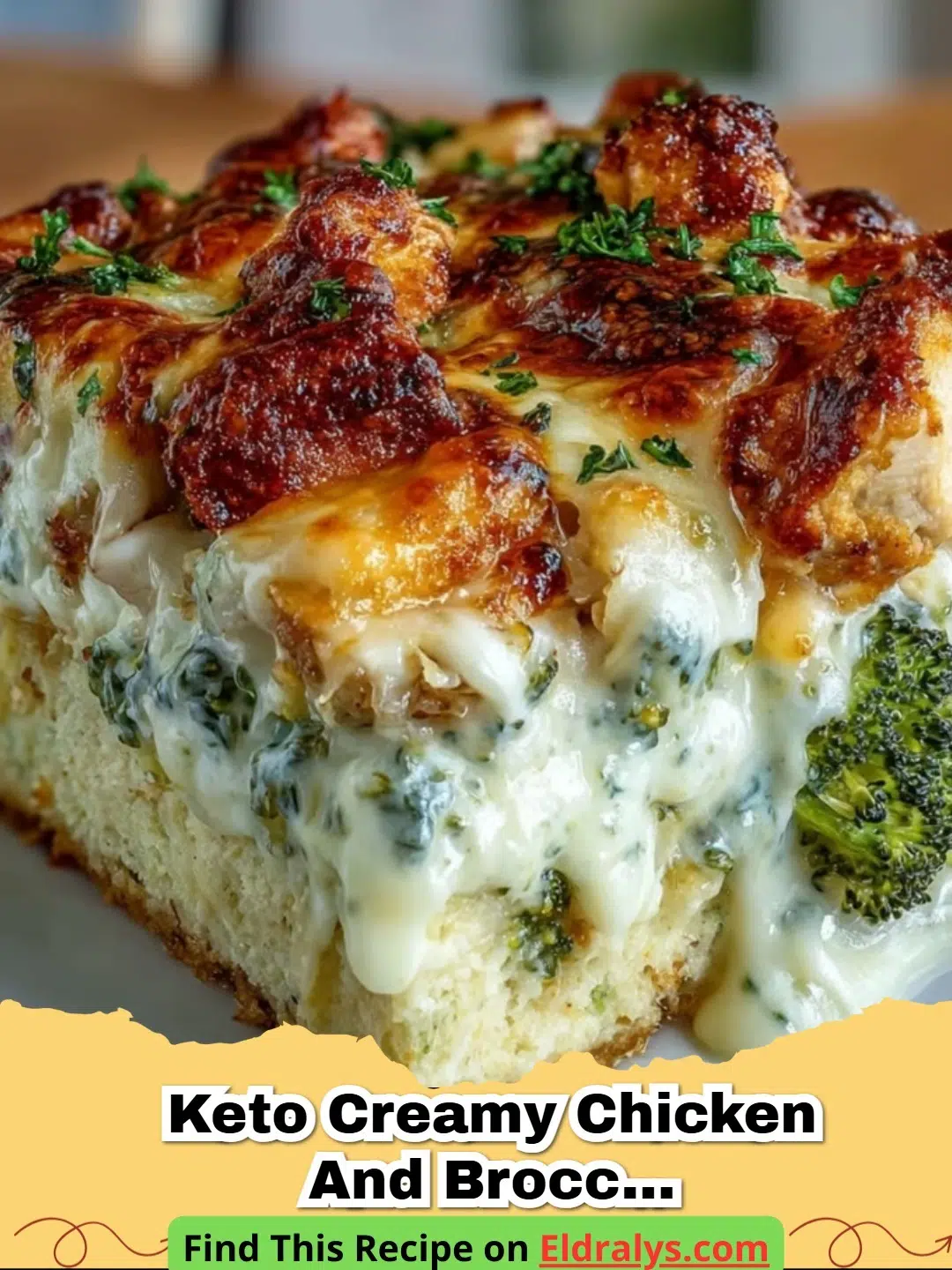 A bubbling Keto Creamy Chicken and Broccoli Casserole in a glass baking dish topped with melted cheddar cheese.