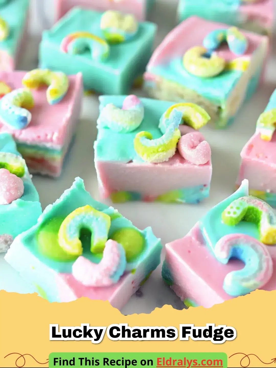 A close-up shot of creamy white Lucky Charms Fudge topped with vibrant rainbow marshmallows