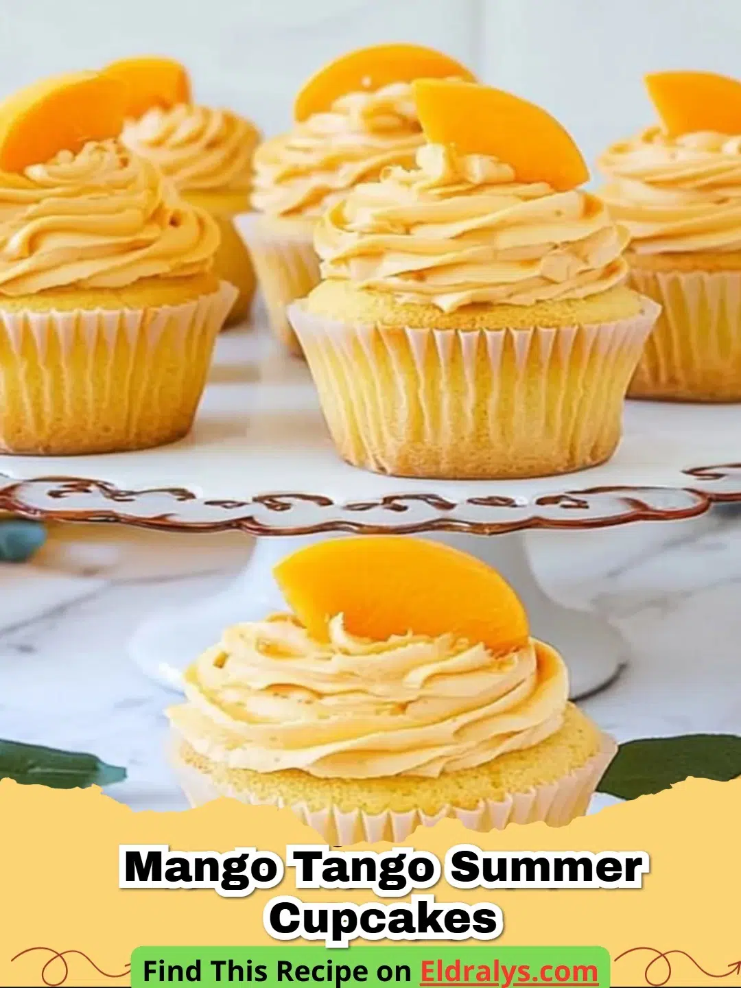 A close up of Mango Tango Summer Cupcakes with lime zest garnish
