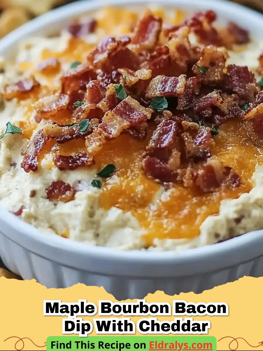 A bubbly, golden brown Maple Bourbon Bacon Cheddar Dip served in a cast iron skillet with crackers.