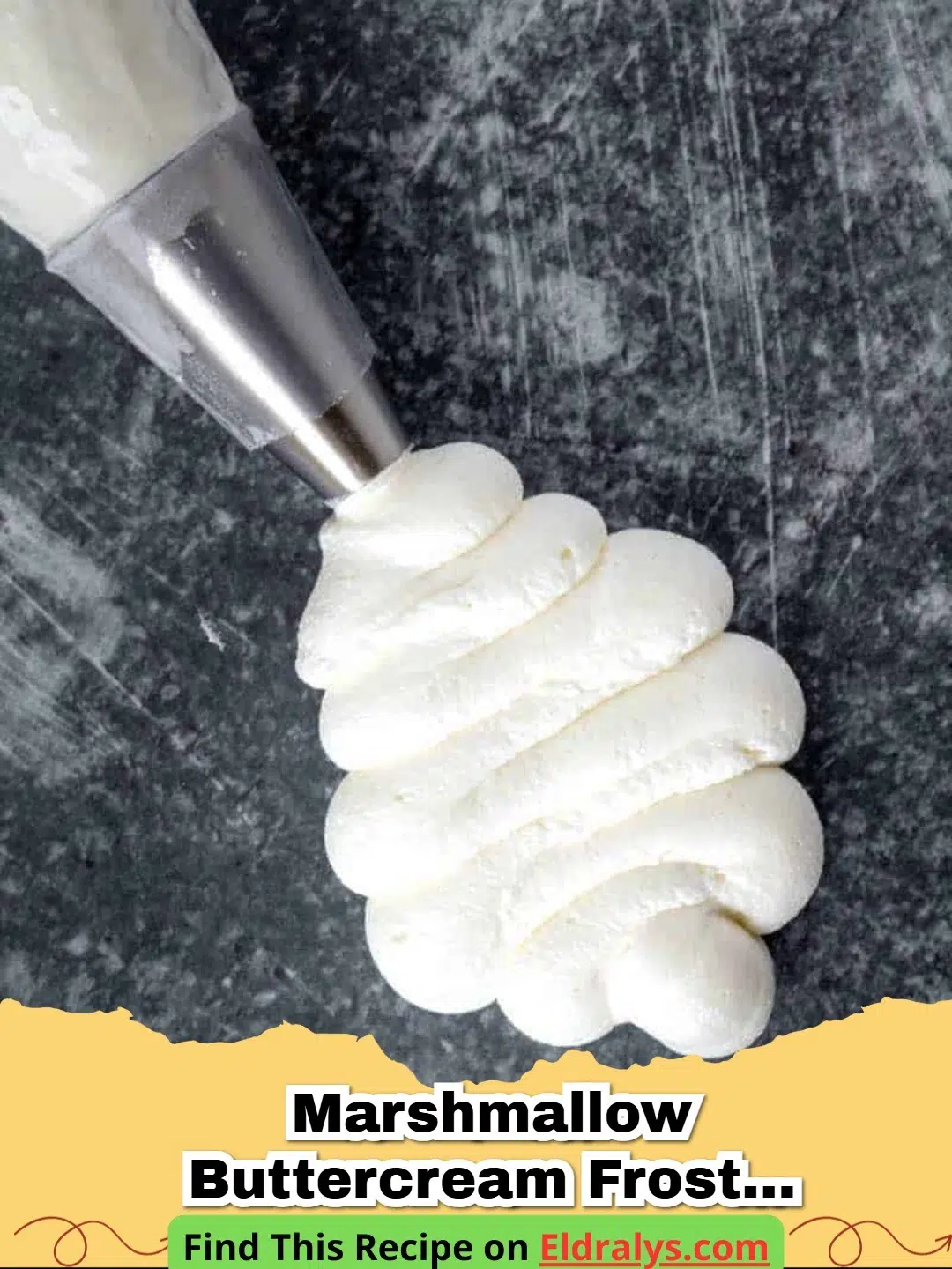 Close up of fluffy Marshmallow Buttercream Frosting Recipe on a cupcake