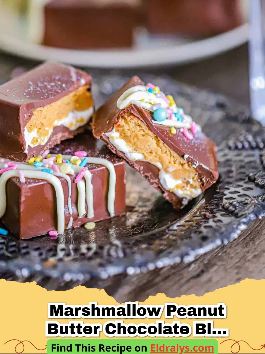 Marshmallow Peanut Butter Chocolate Bliss Bars - Close up of a Marshmallow Peanut Butter Chocolate Bliss Bar showing the layers of graham cracker, peanut butter fudge with marshmallows, and chocolate topping.