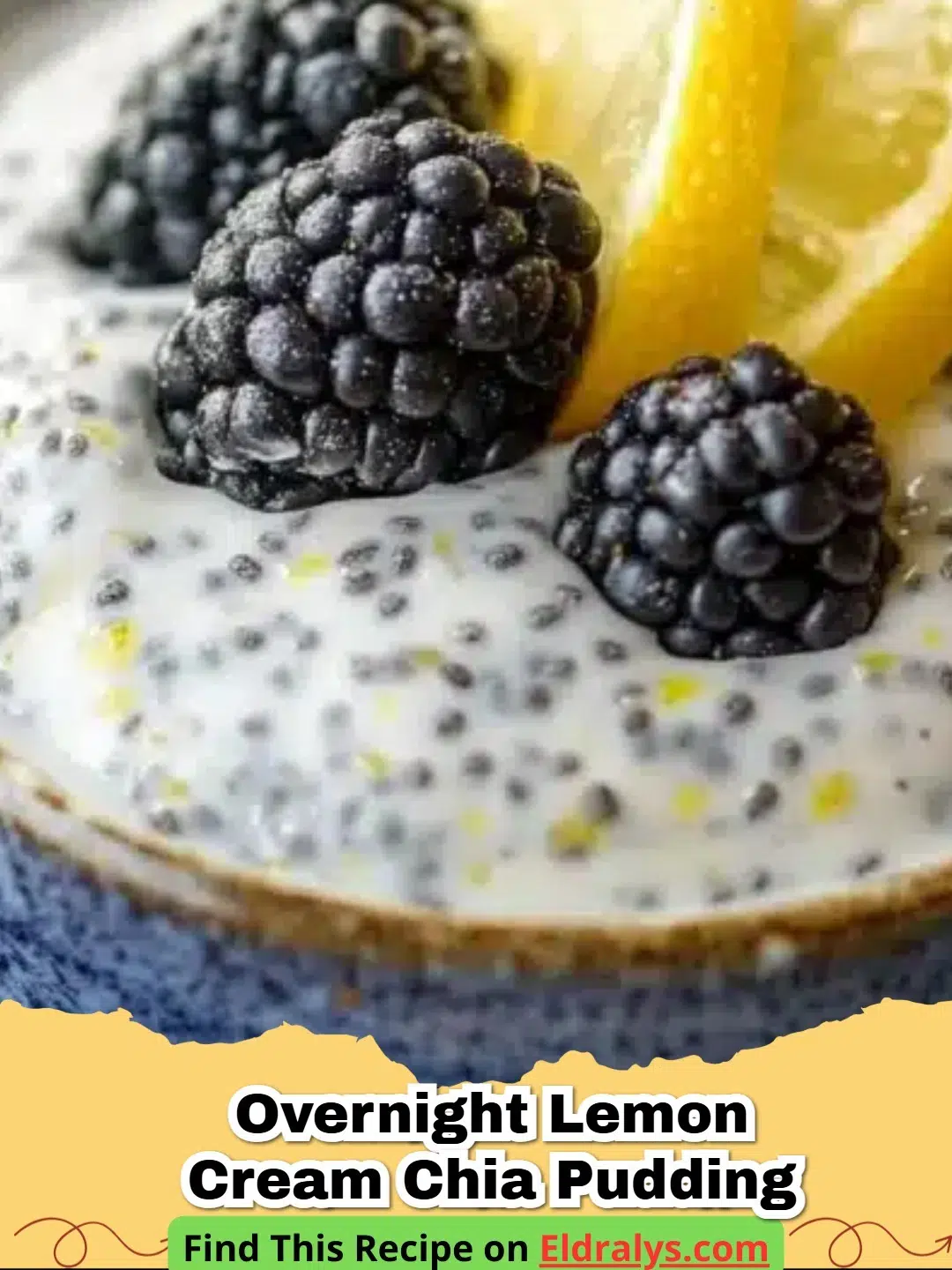 A close up of Overnight Lemon Cream Chia Pudding in a glass jar topped with fresh blueberries and lemon zest.