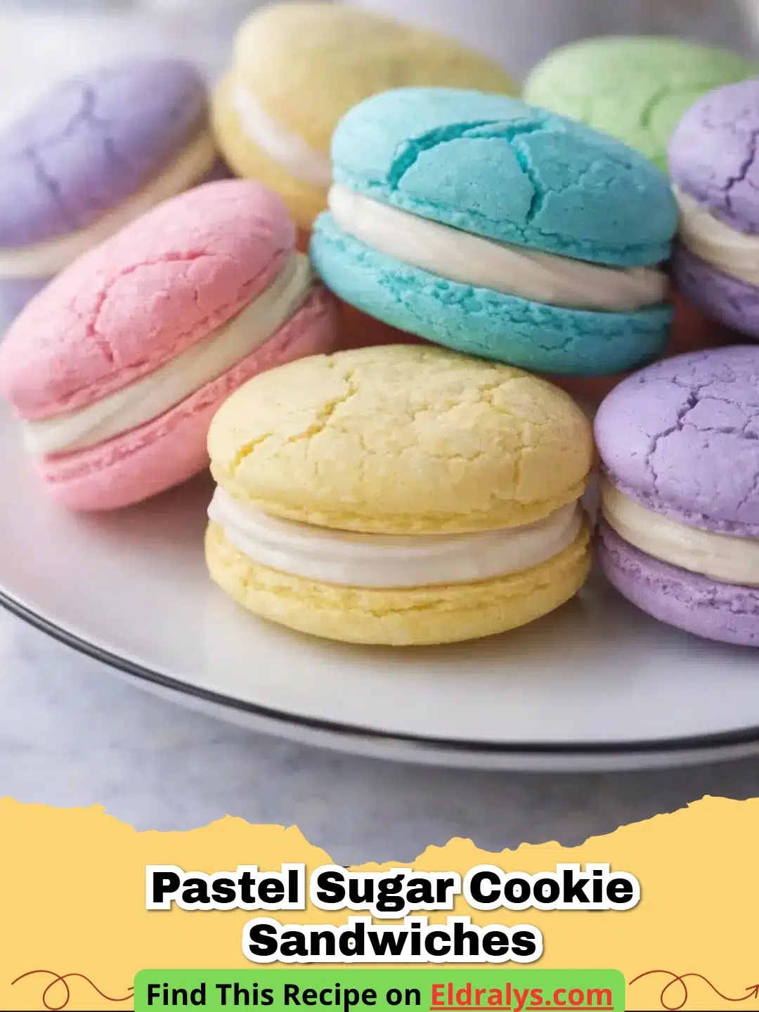 A stack of Pastel Sugar Cookie Sandwiches with pink and blue frosting