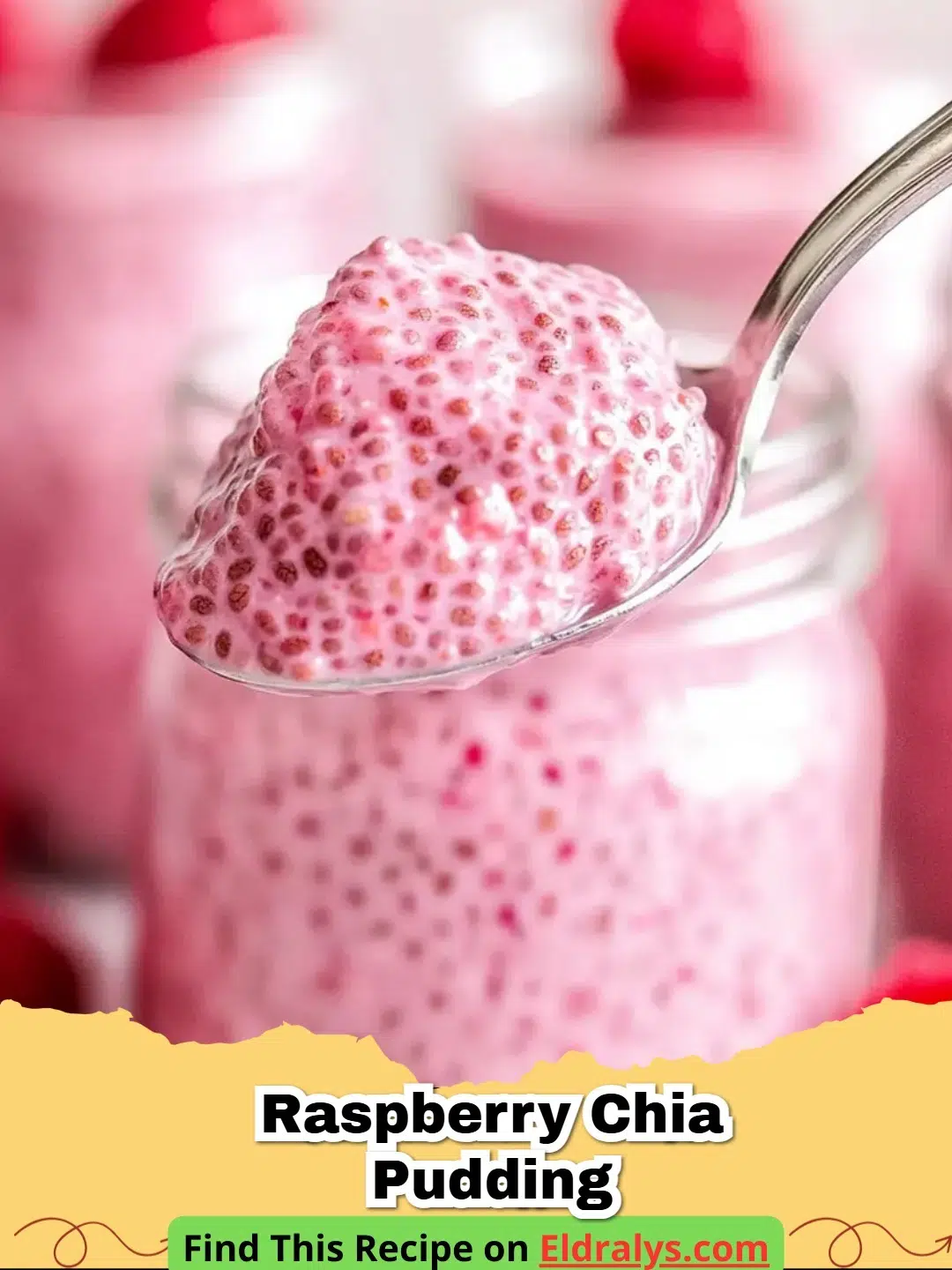 A close up view of Raspberry Chia Pudding topped with fresh berries in a glass jar