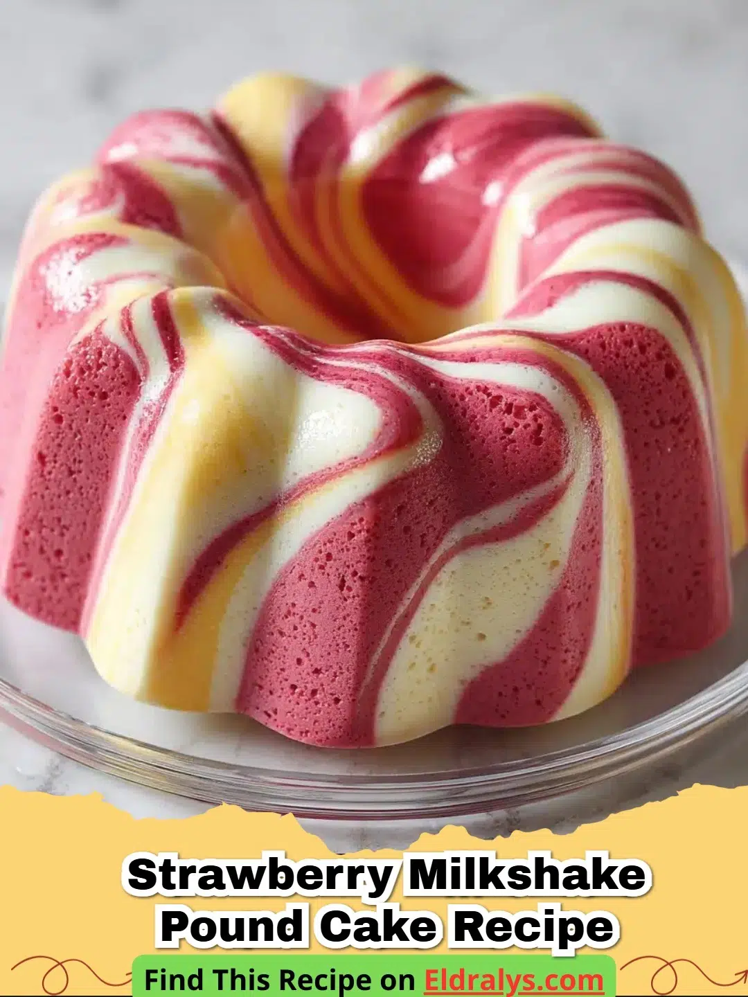 Strawberry Milkshake Pound Cake Recipe - A beautiful pink Strawberry Milkshake Pound Cake with a sweet glaze and fresh strawberries on top.