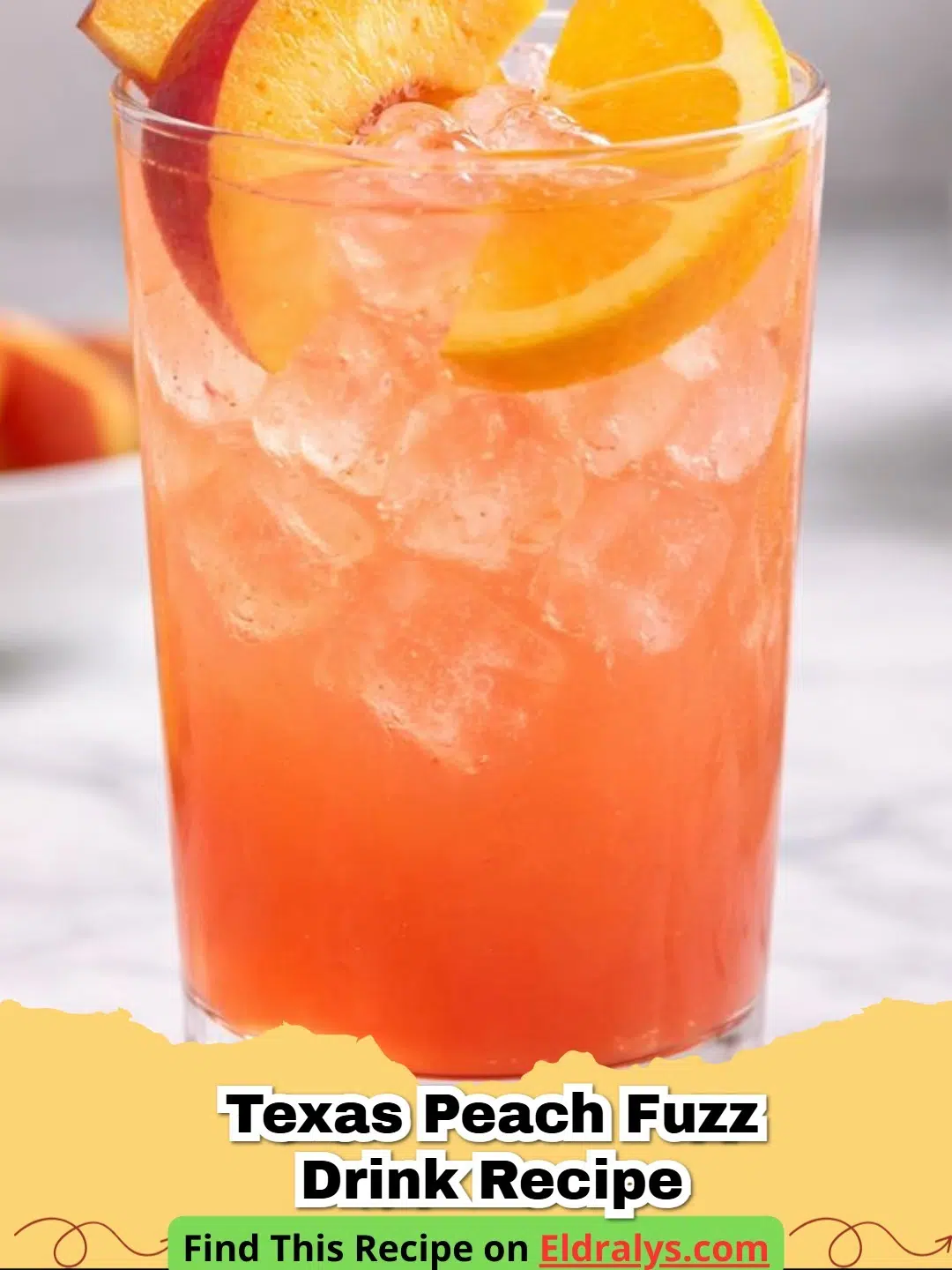 A glass of Texas Peach Fuzz Drink Recipe garnished with mint and a fresh peach slice on a sunny wooden table.