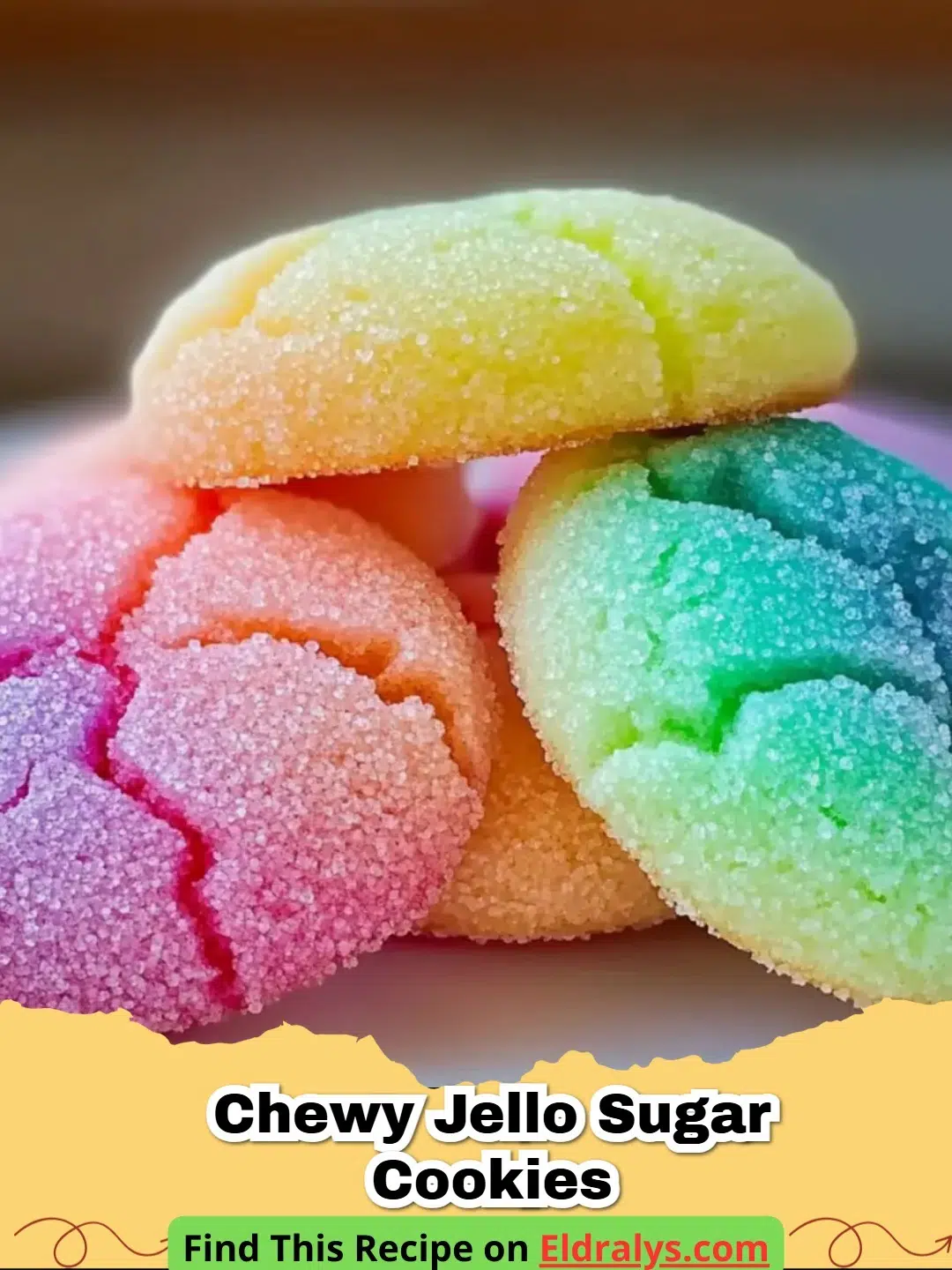 A plate of multi-colored Chewy Jello Sugar Cookies including red, green, and orange varieties.