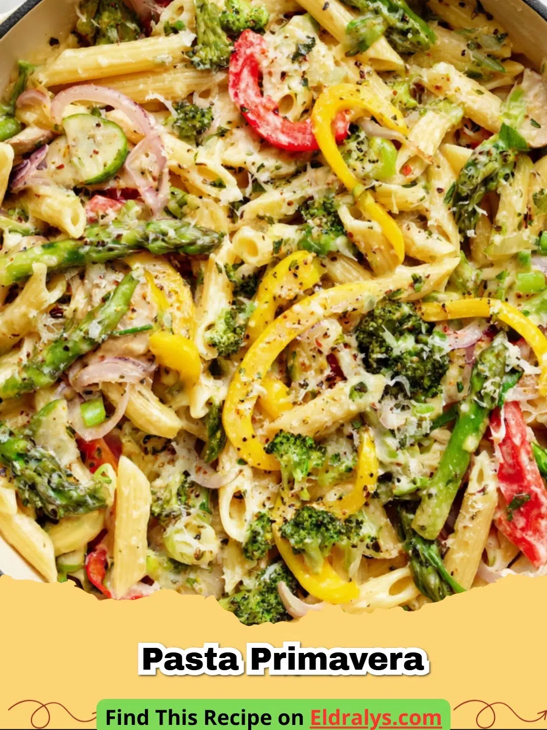 A large white bowl filled with vibrant Pasta Primavera featuring broccoli, carrots, and zucchini.