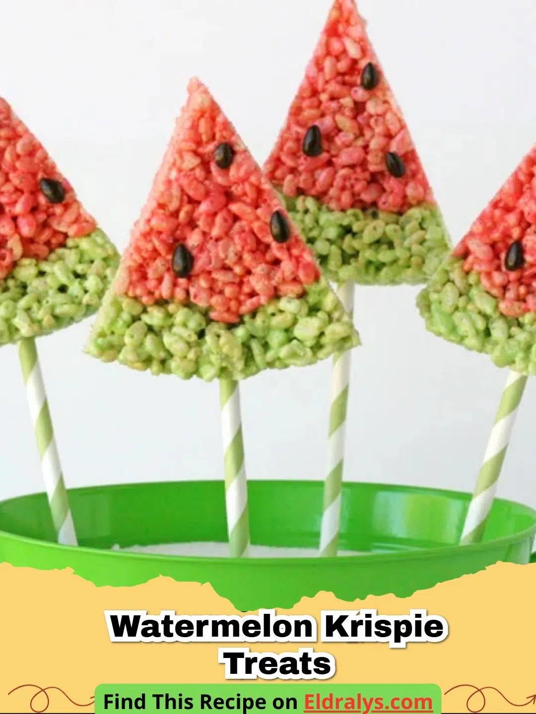 Slices of pink and green Watermelon Krispie Treats with chocolate chip seeds on a white plate.