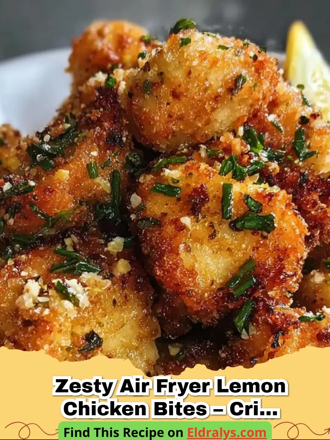 Zesty Air Fryer Lemon Chicken Bites – Crispy & Juicy - Golden brown and zesty air fryer lemon chicken bites served on a plate with fresh lemon wedges.