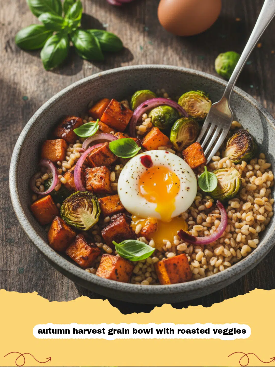 A colorful autumn harvest grain bowl with roasted veggies, topped with tahini dressing and pomegranate seeds.