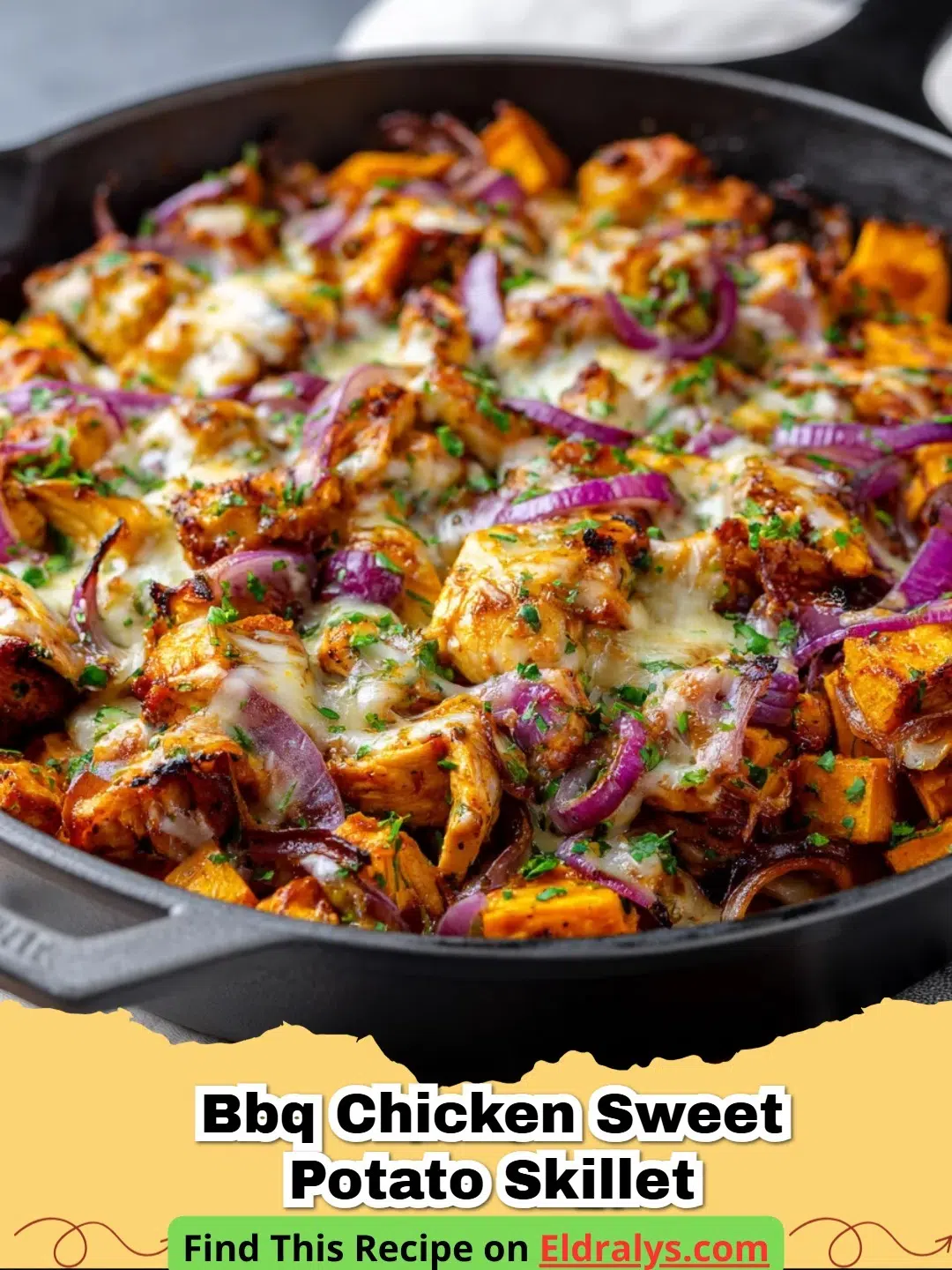 A close-up view of a BBQ Chicken Sweet Potato Skillet with vibrant peppers and fresh cilantro.