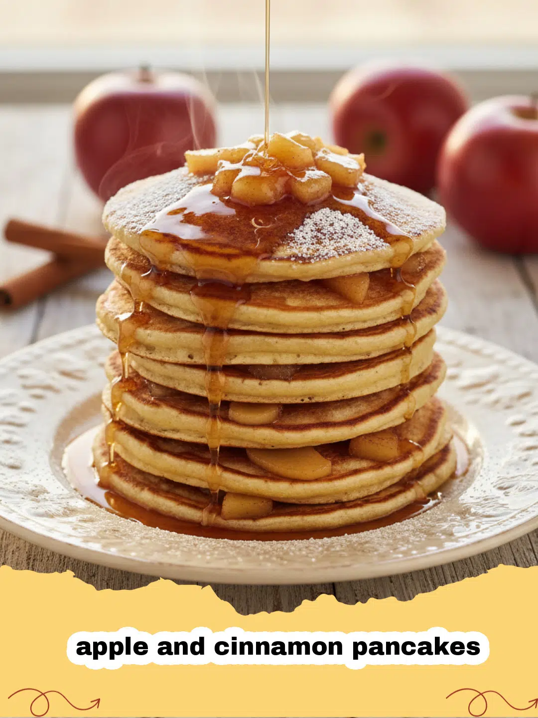 A stack of fluffy apple and cinnamon pancakes topped with sliced apples and maple syrup.