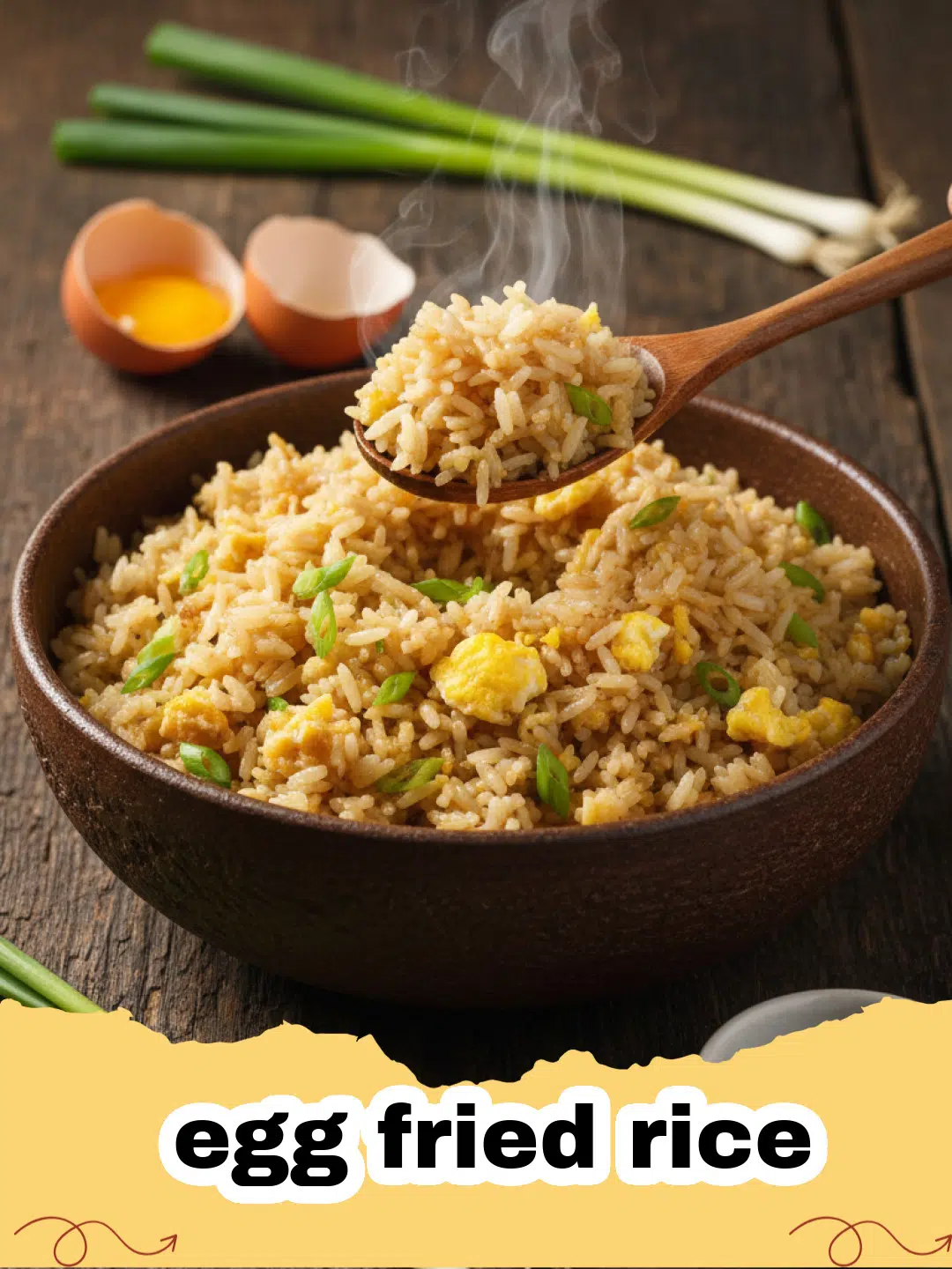 A close-up shot of fluffy classic egg fried rice in a bowl, garnished with green onions and a side of chili oil.
