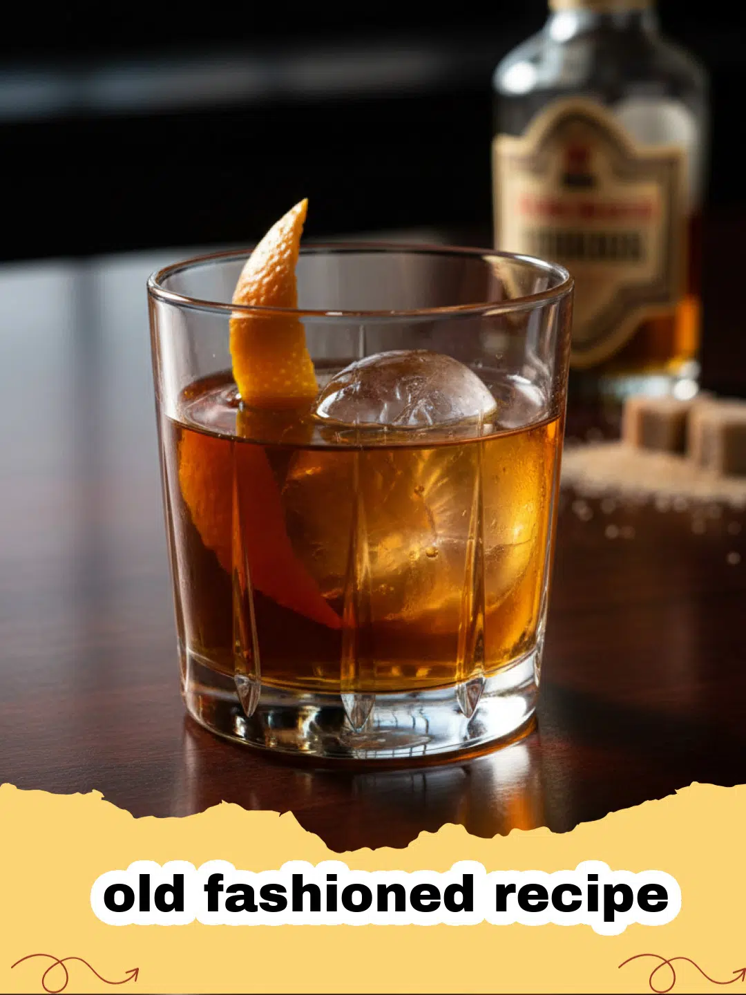 old fashioned recipe - A perfectly crafted Old Fashioned cocktail in a rocks glass with a large ice cube and an orange peel garnish on a dark wooden surface.
