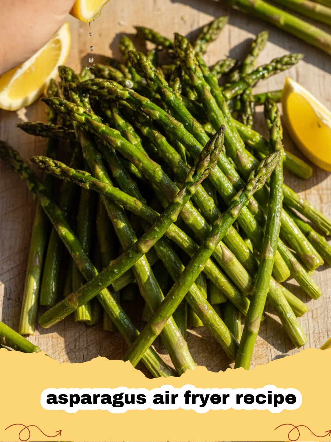 asparagus air fryer recipe - Close-up of crispy air fryer asparagus with garlic and Parmesan cheese on a white plate.