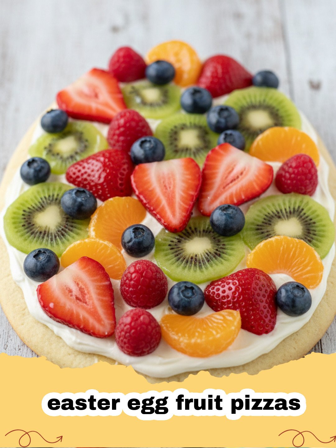 easter egg fruit pizzas - Colorful Easter Egg Fruit Pizzas decorated with fresh berries, kiwi, and mandarin oranges on a white platter, perfect for a spring dessert.