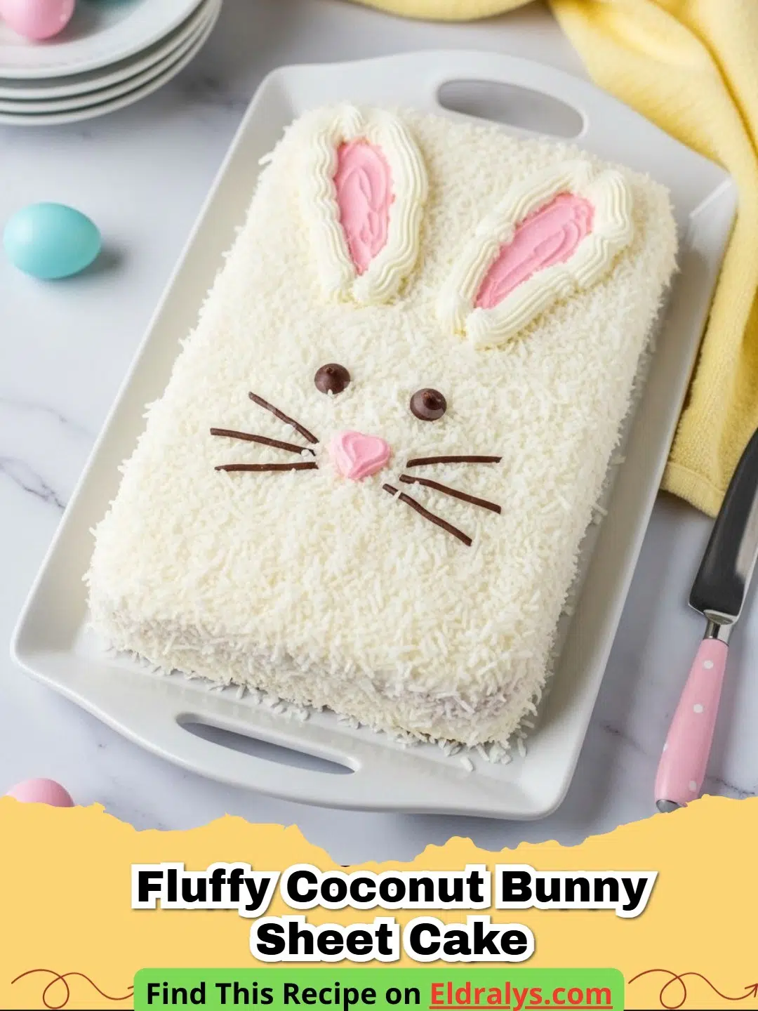A close up of a Fluffy Coconut Bunny Sheet Cake decorated with a white coconut bunny face and marshmallow ears.