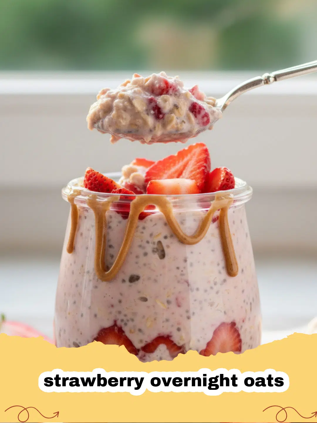 A glass jar filled with creamy strawberry overnight oats, topped with fresh sliced strawberries and a sprig of mint, ready for breakfast.