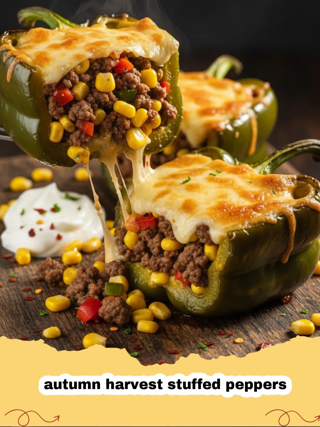 A tray of colorful autumn harvest stuffed peppers topped with melted cheese and fresh herbs.