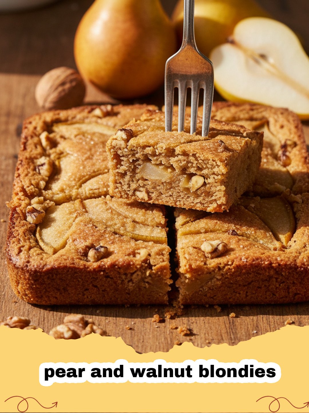 A tray of freshly baked pear and walnut blondies sliced into squares.
