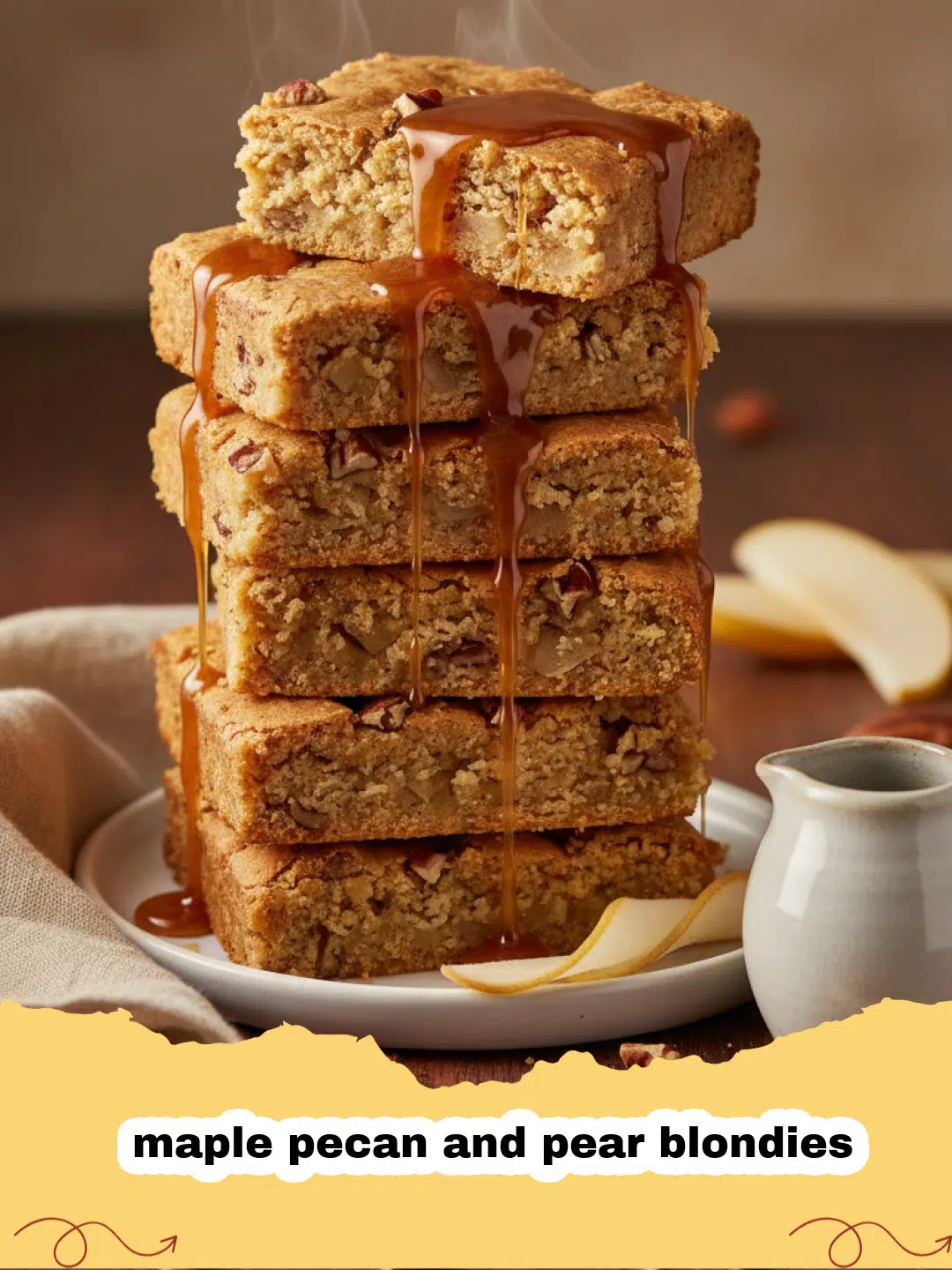 A close up shot of a stack of maple pecan and pear blondies on a wooden board.