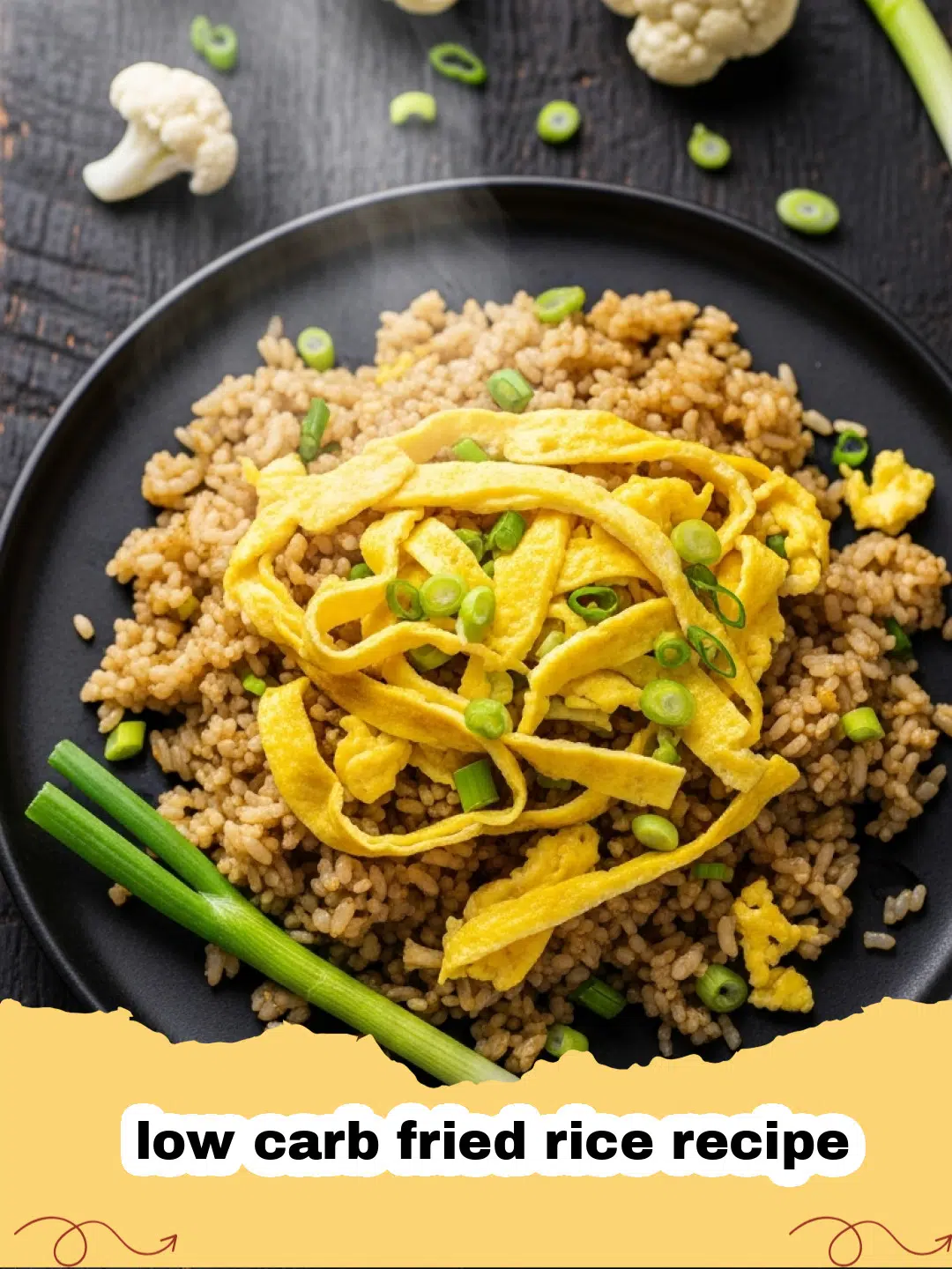 low carb fried rice recipe - A bowl of colorful low carb fried rice with cauliflower, peas, carrots, and eggs.